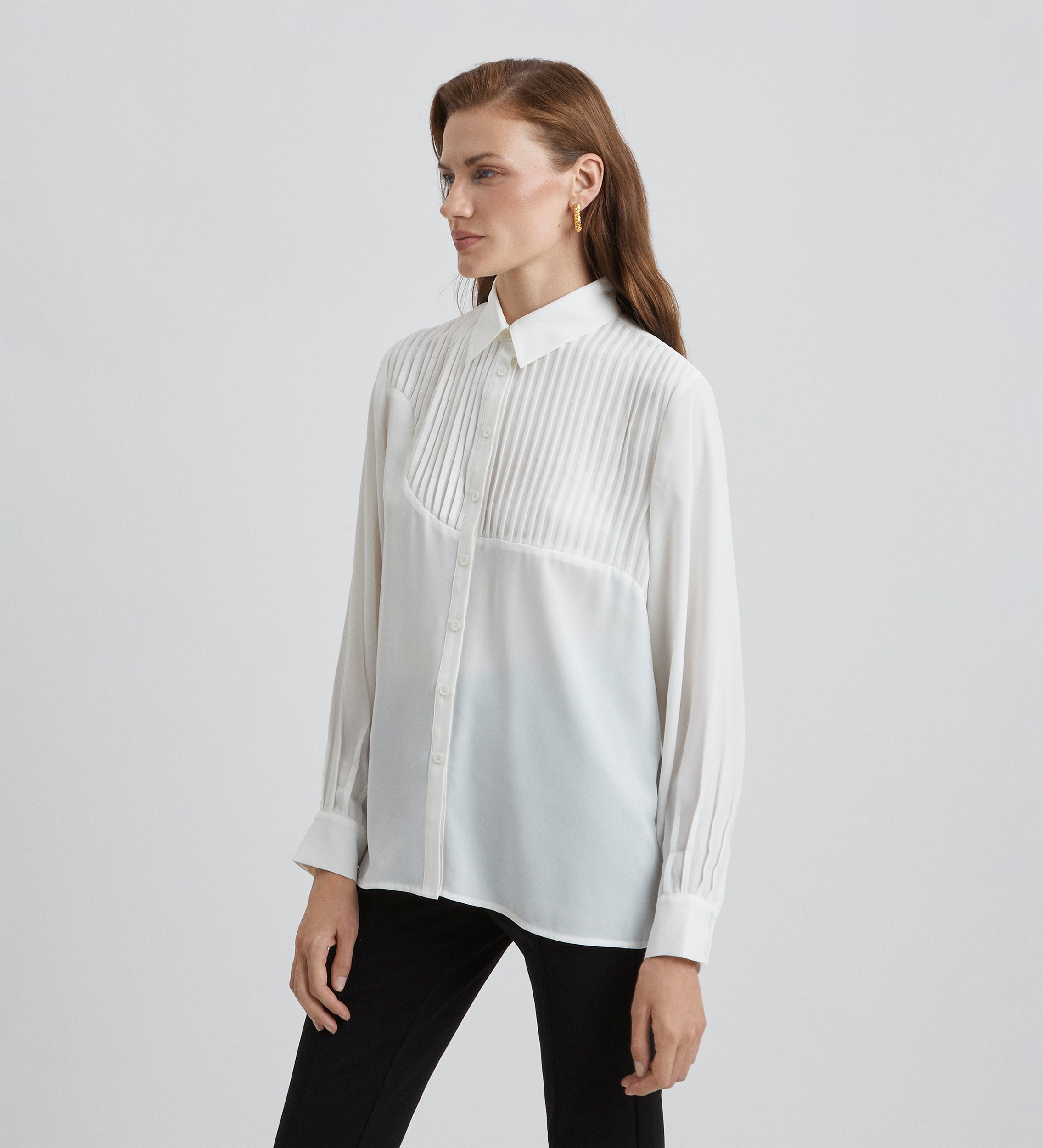 Blouse à lattes à manches bouffantes
