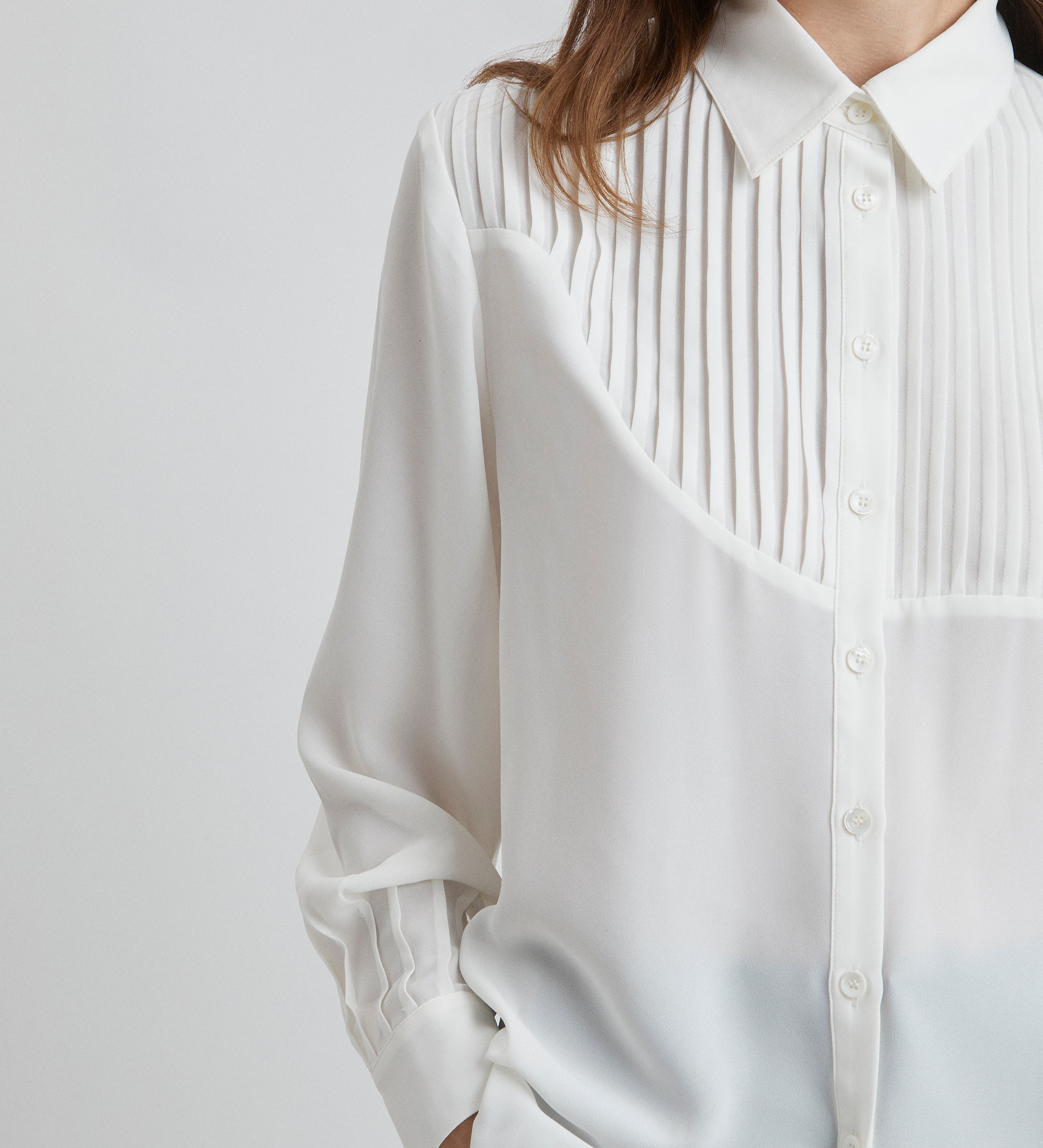 Blouse à lattes à manches bouffantes