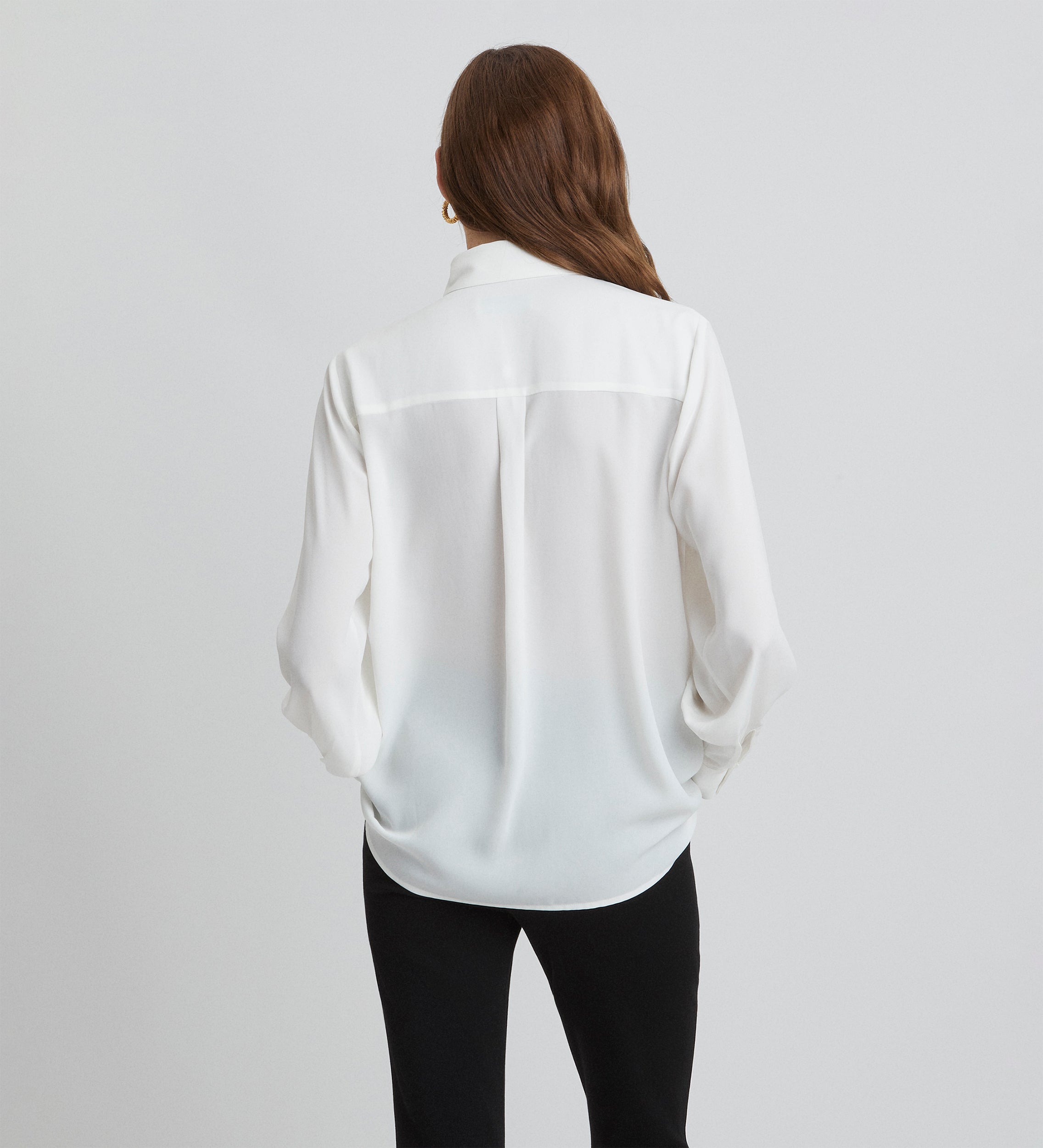Blouse à lattes à manches bouffantes