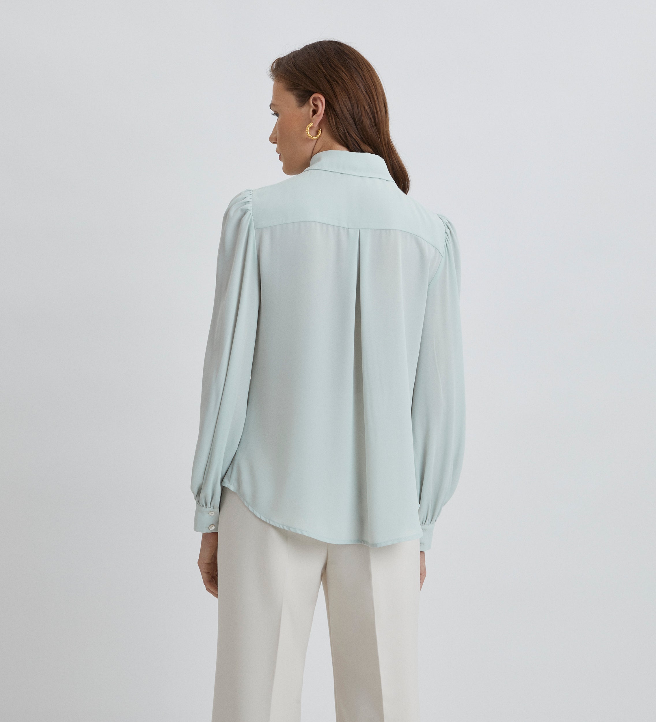 Blouse à empiècement froncé