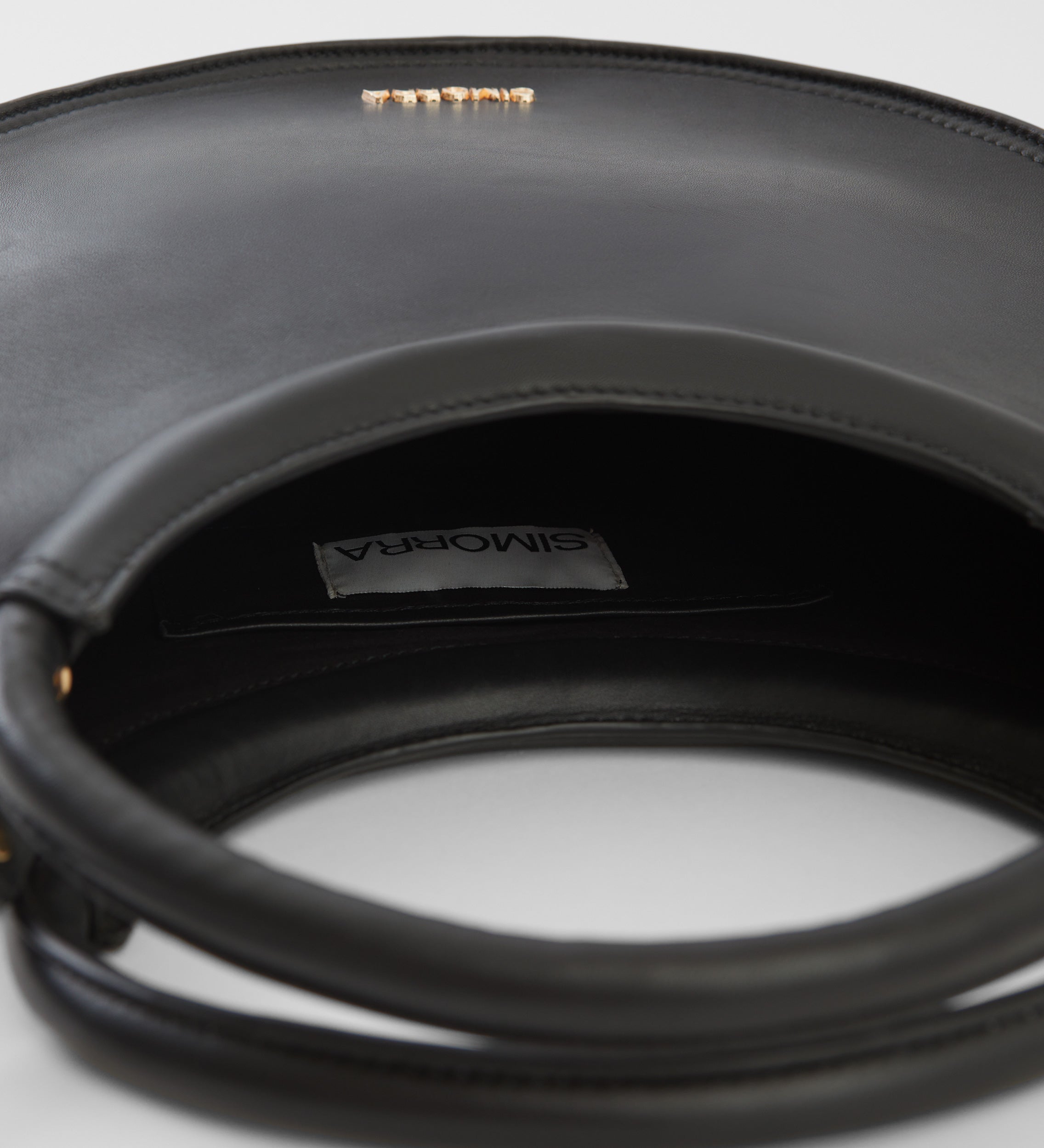 Bolso circular piel