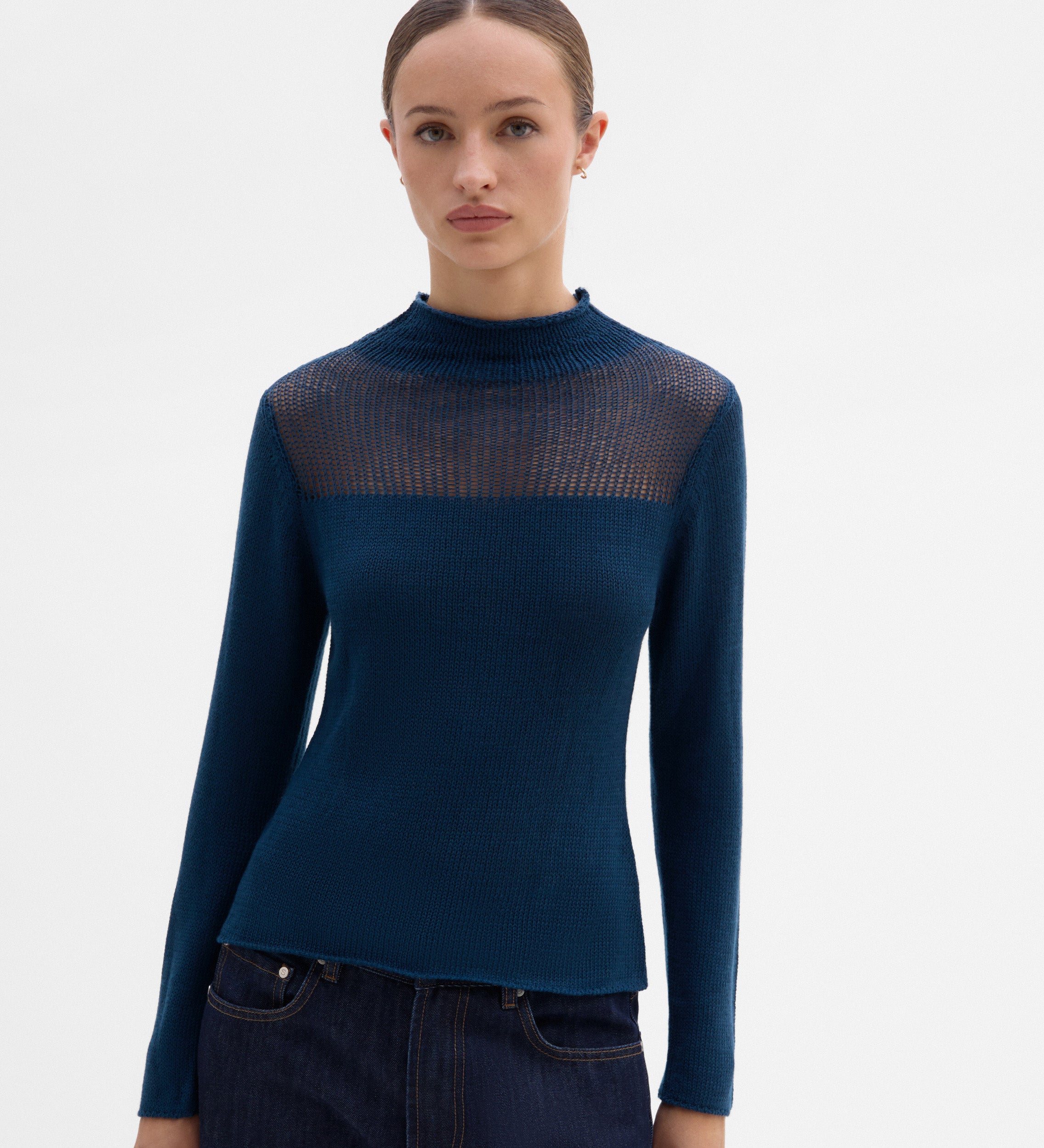 Sweater with unstitched detail
