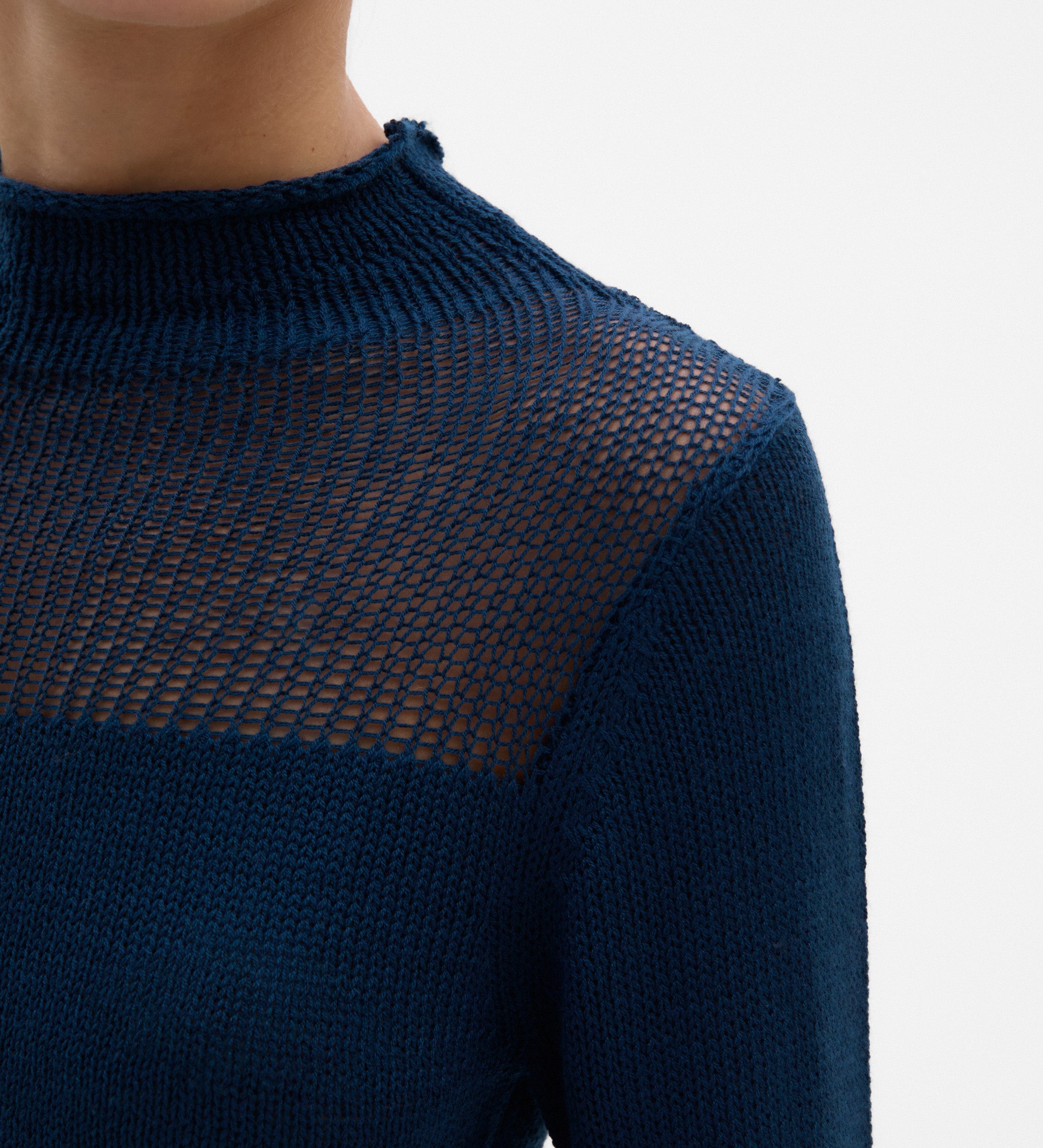 Sweater with unstitched detail