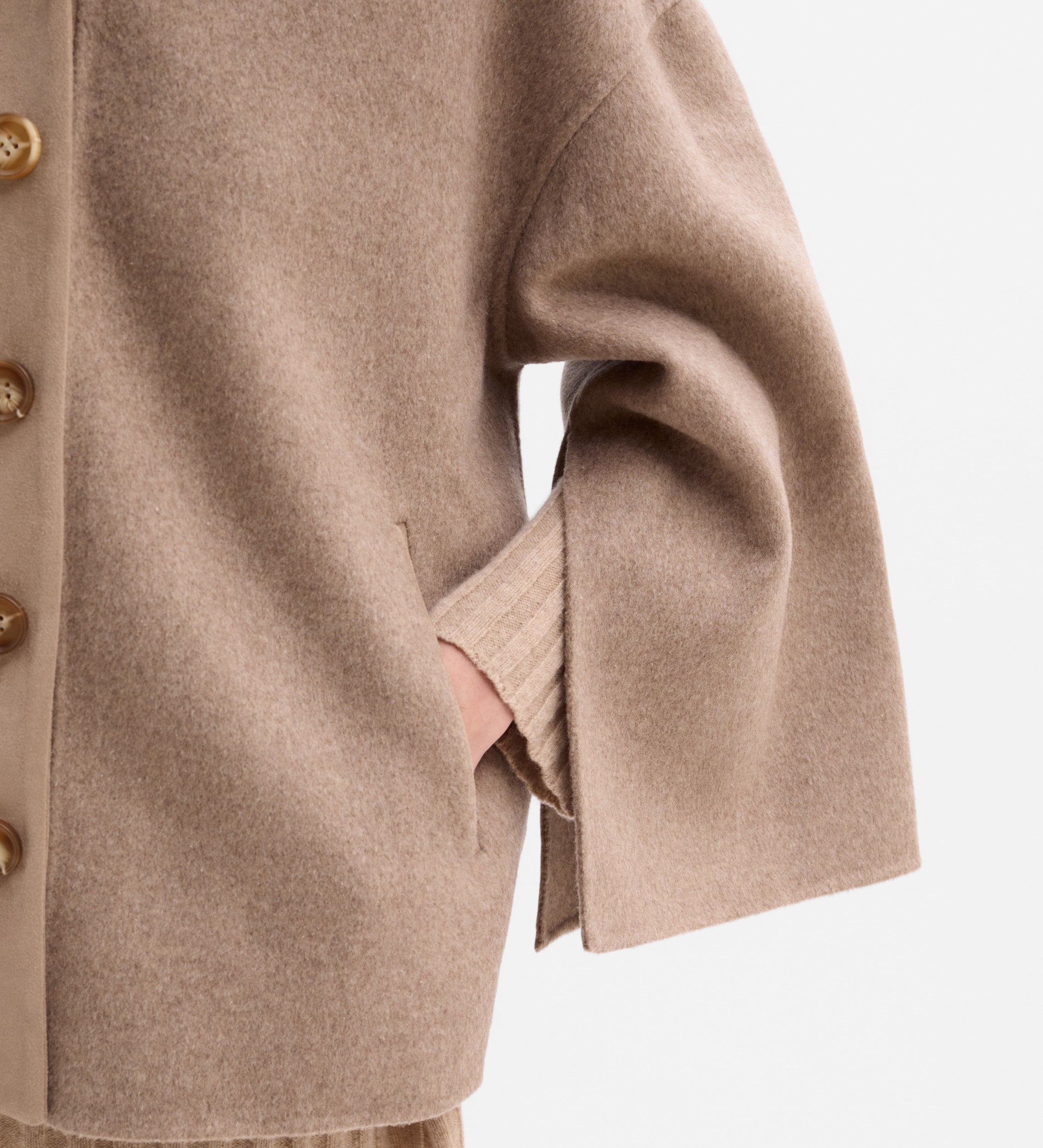 Chaqueta abertura mangas