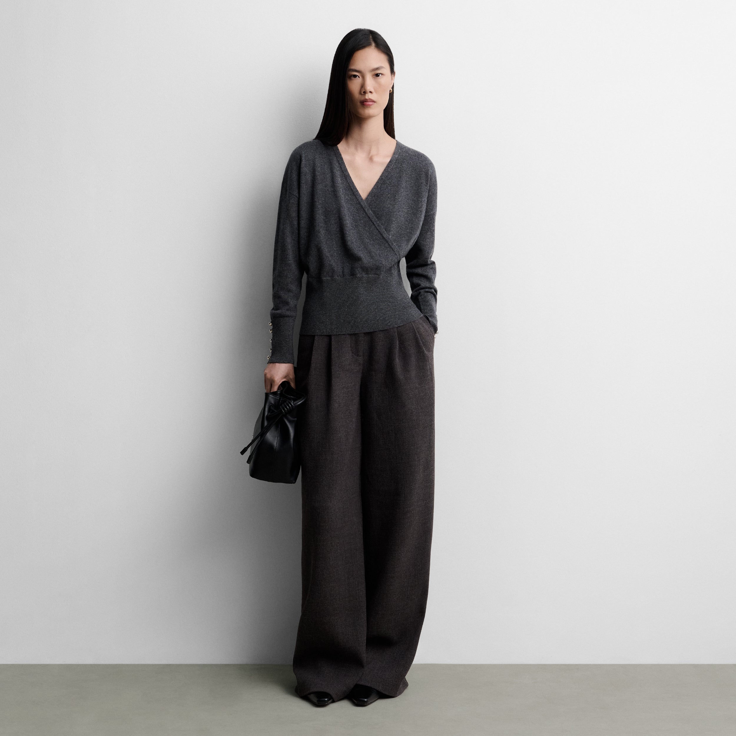 Knit sweater with wrap detail