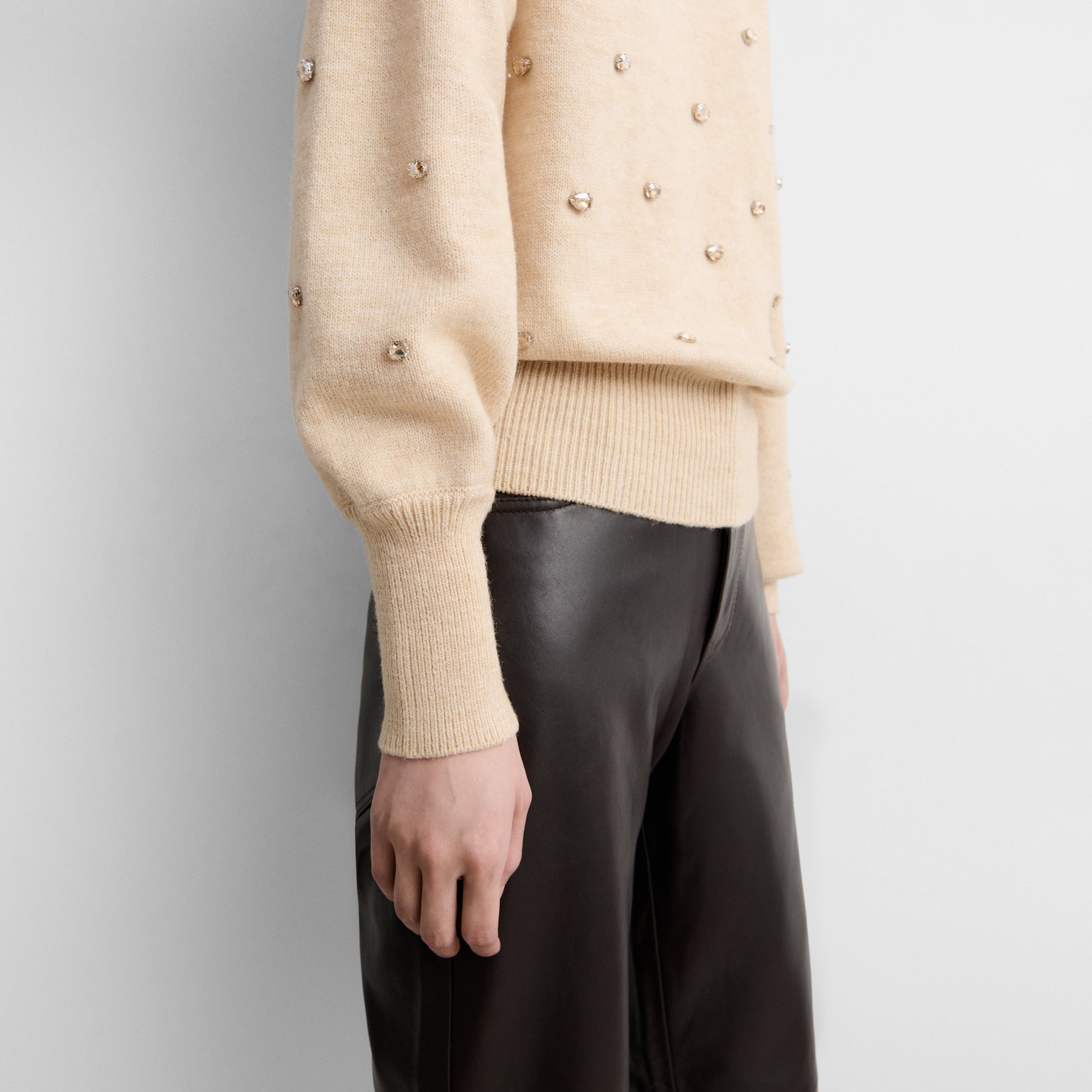 Knit sweater with rhinestones