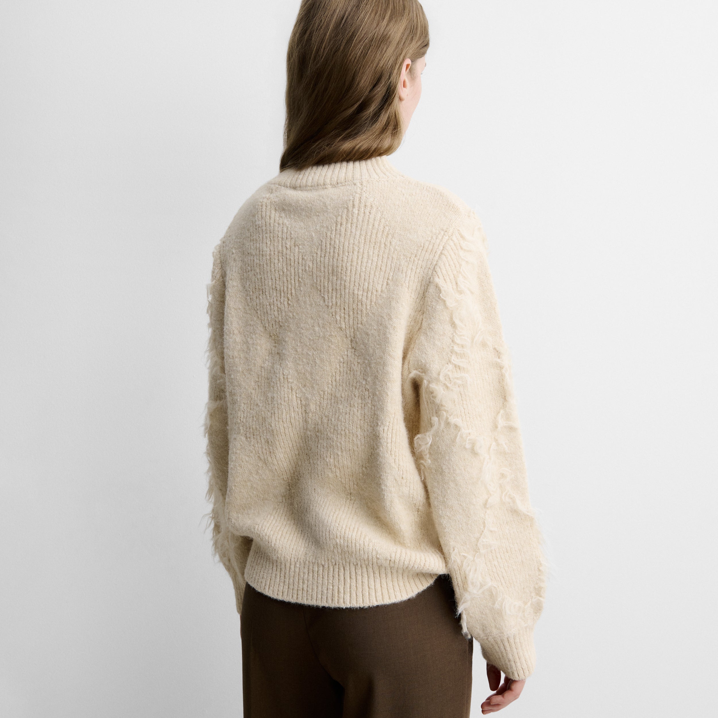 Fringed diamond-pattern sweater