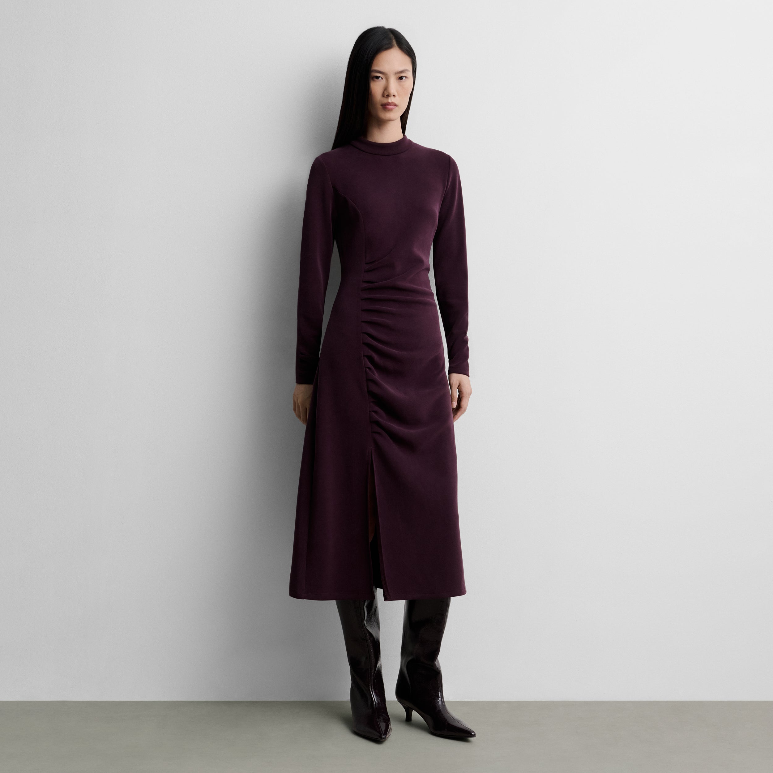 Dress with side draping