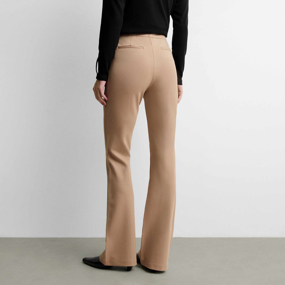 Stretch trousers with locker-loop fastening