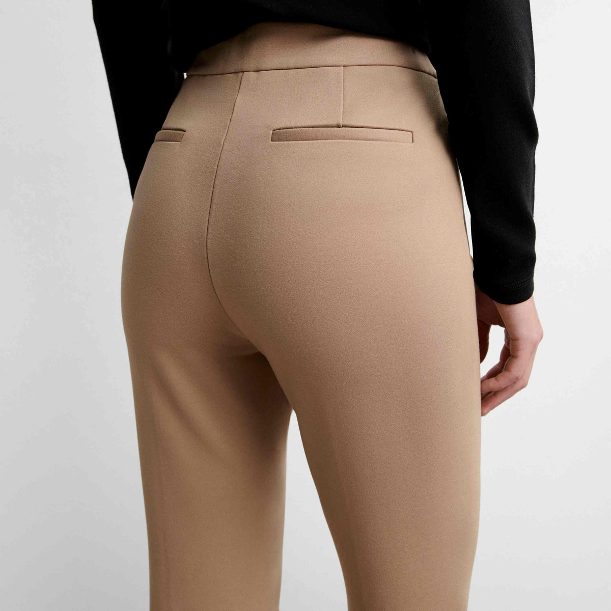 Stretch trousers with locker-loop fastening