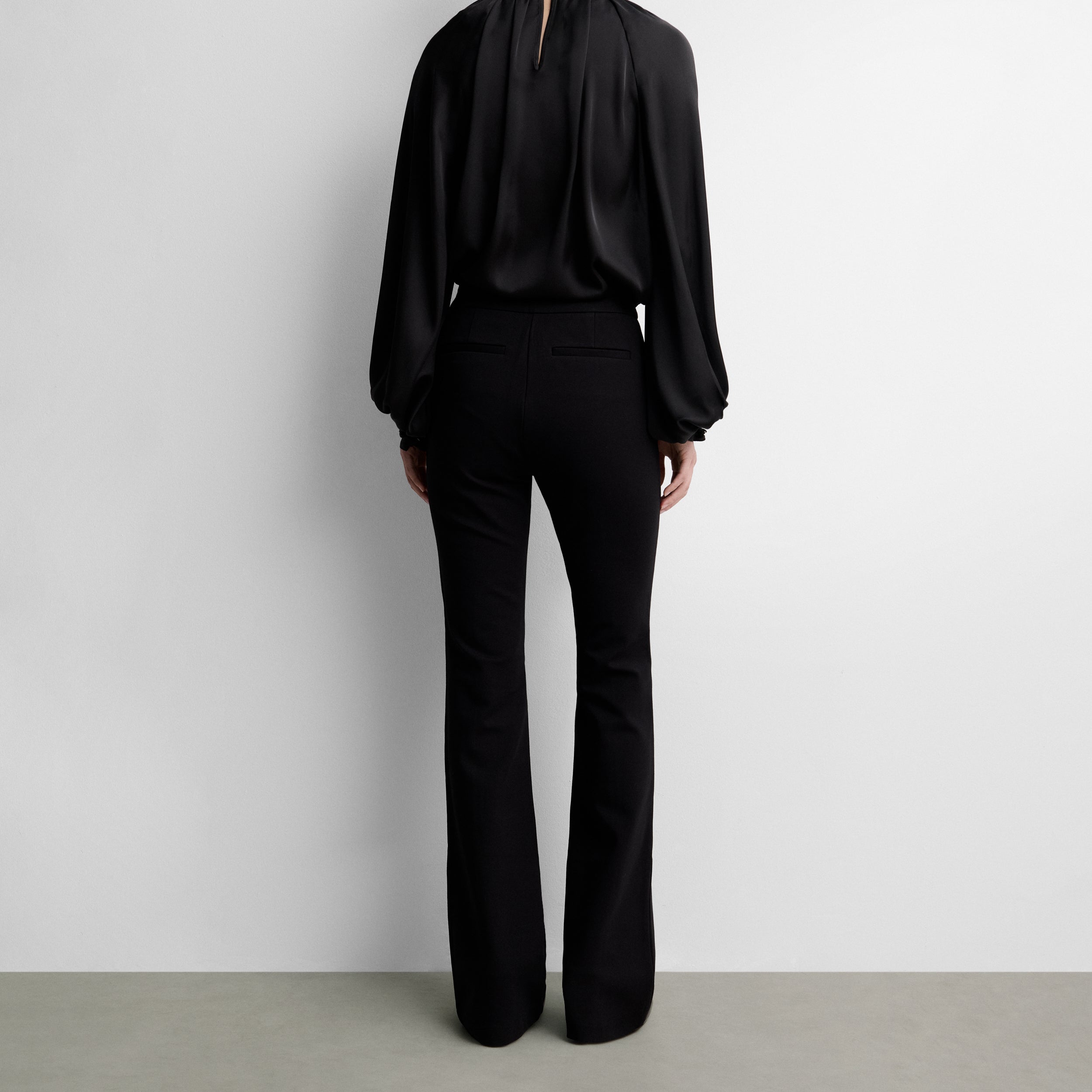 Elastic trousers with locker-loop fastening