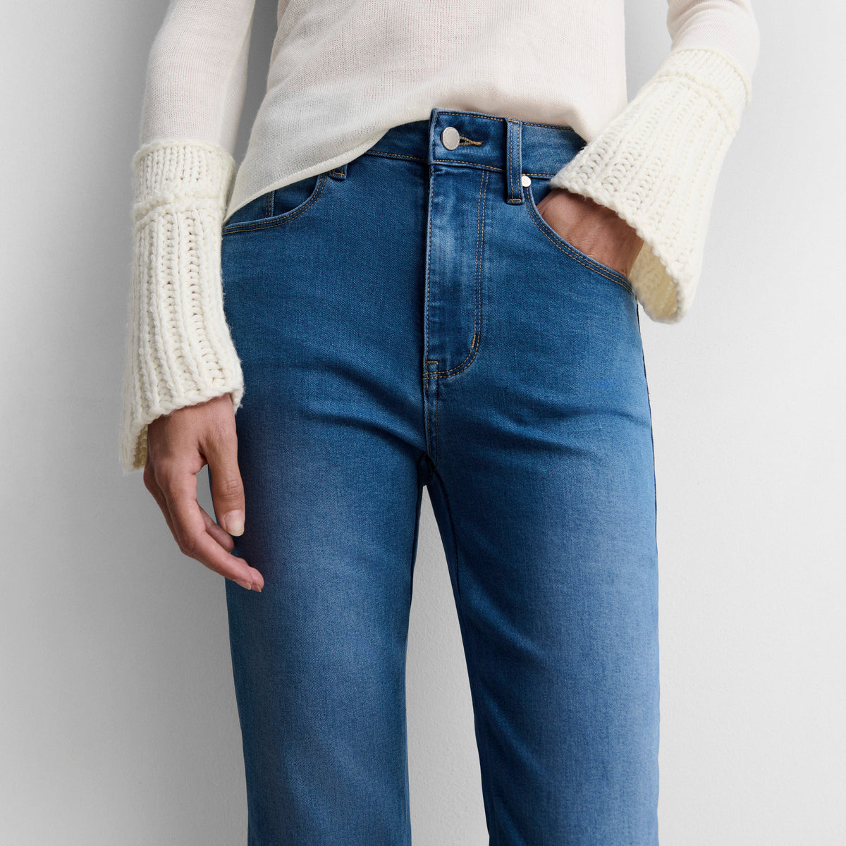 Flared denim trousers