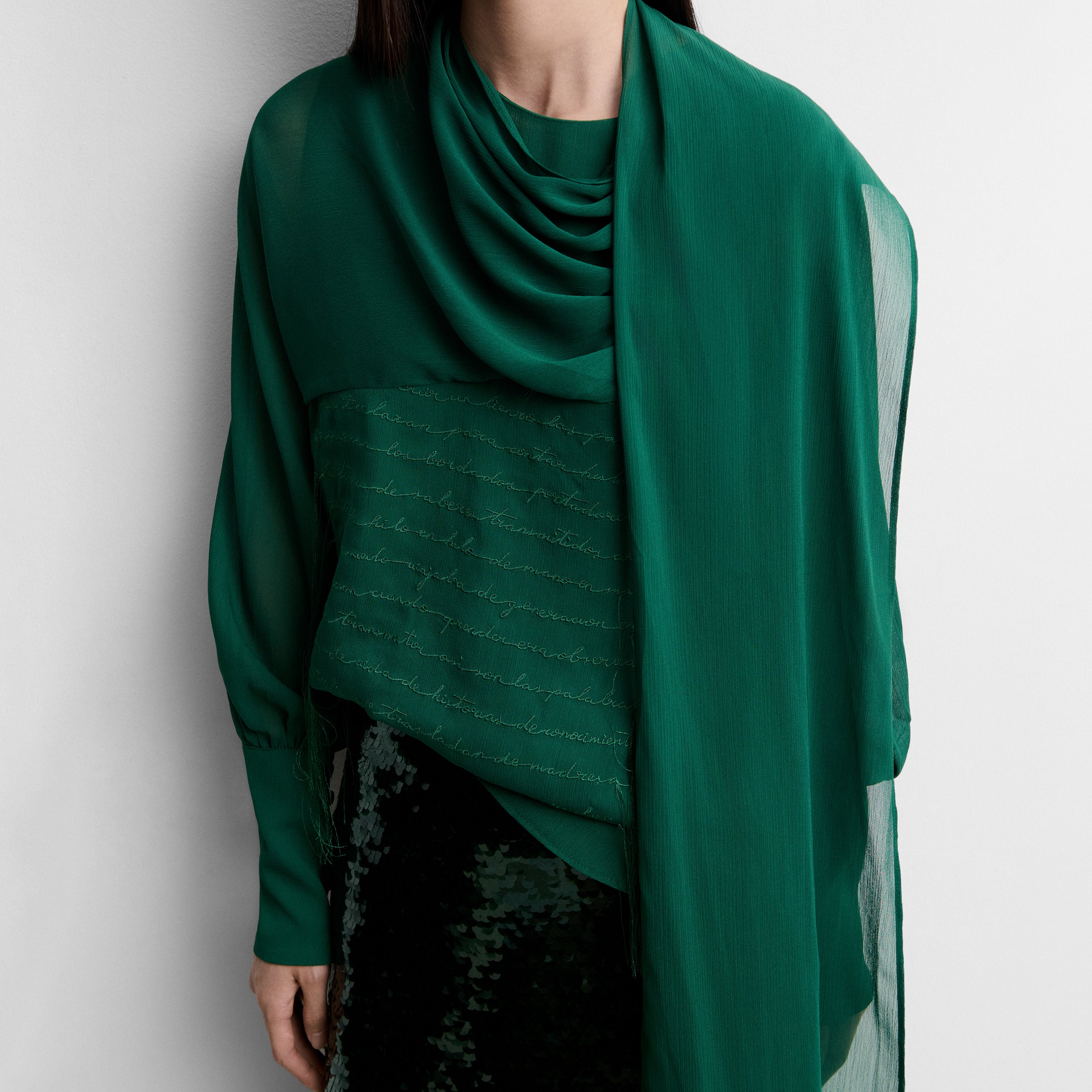 Embroidered handkerchief-hem blouse