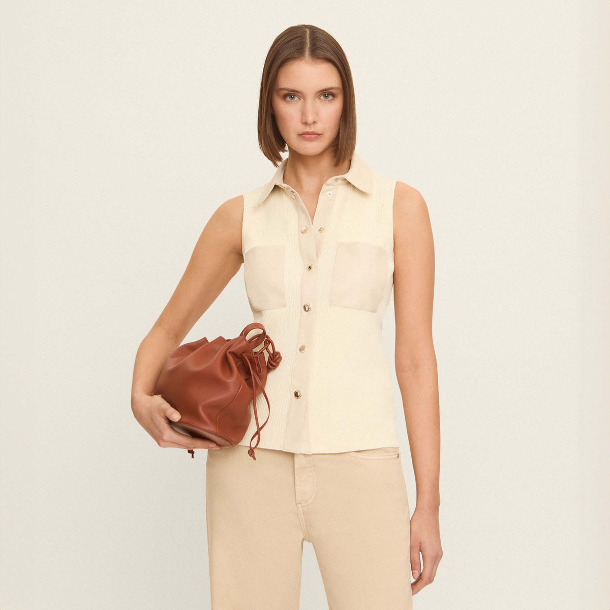 Knitted top with eco-leather