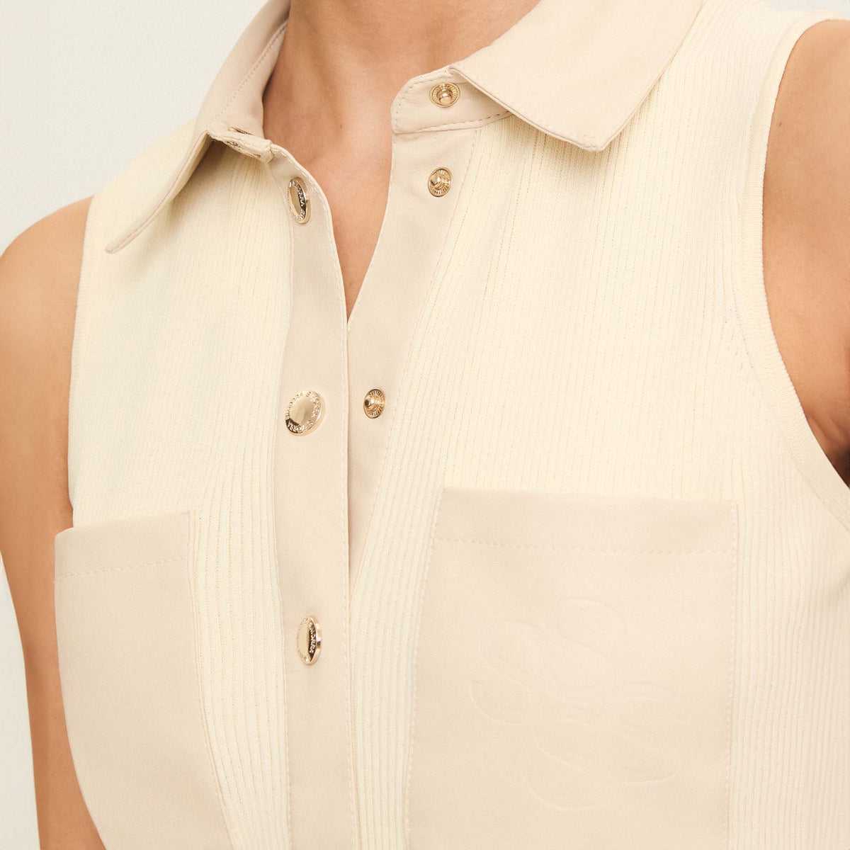 Knitted top with eco-leather