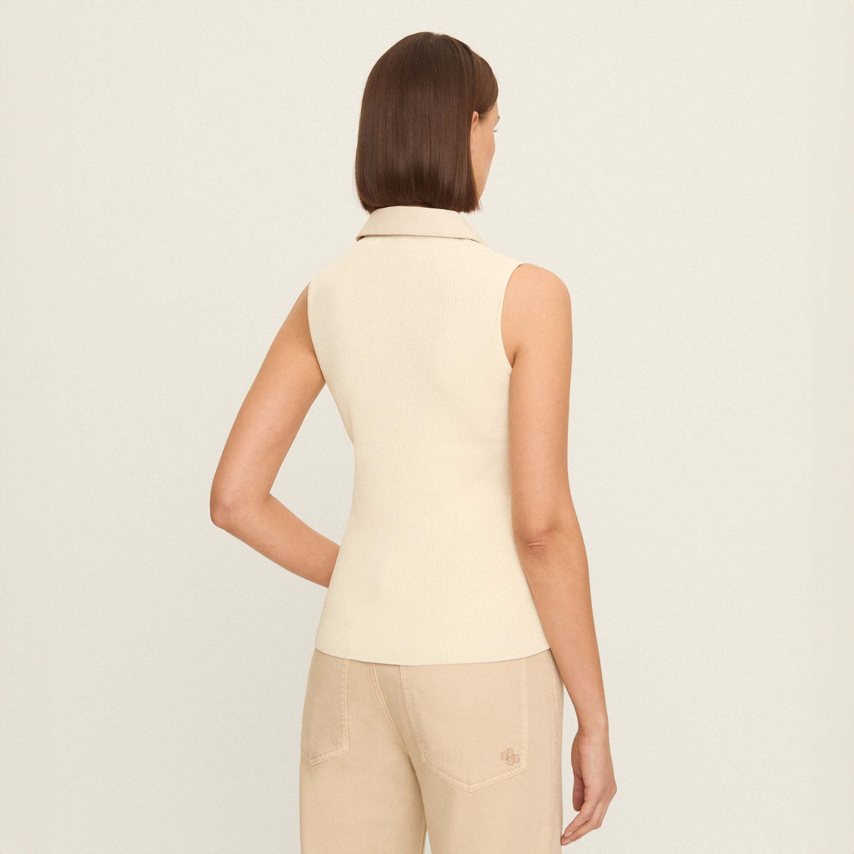 Knitted top with eco-leather