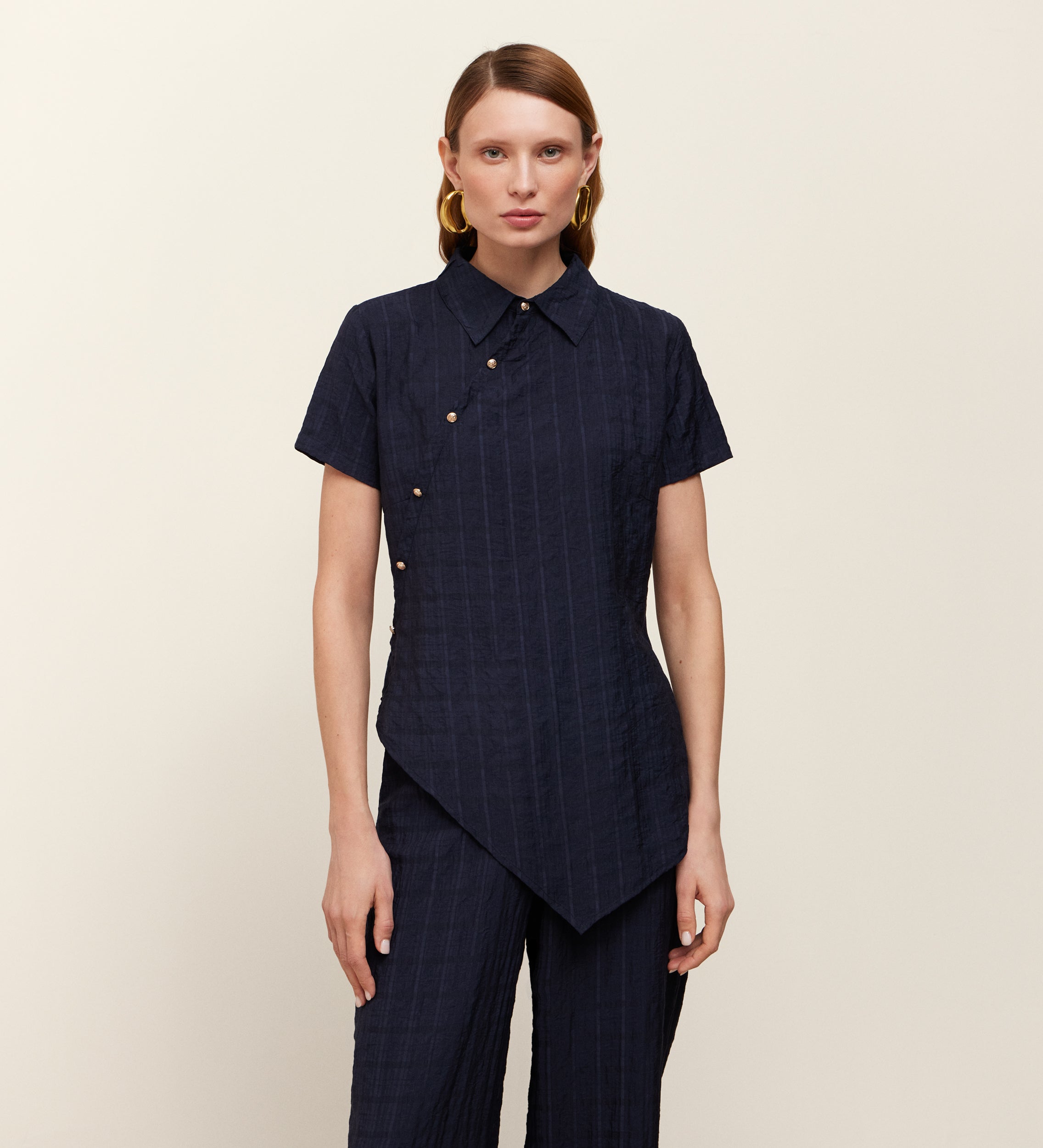 Top asymétrique en tricot bi-matière