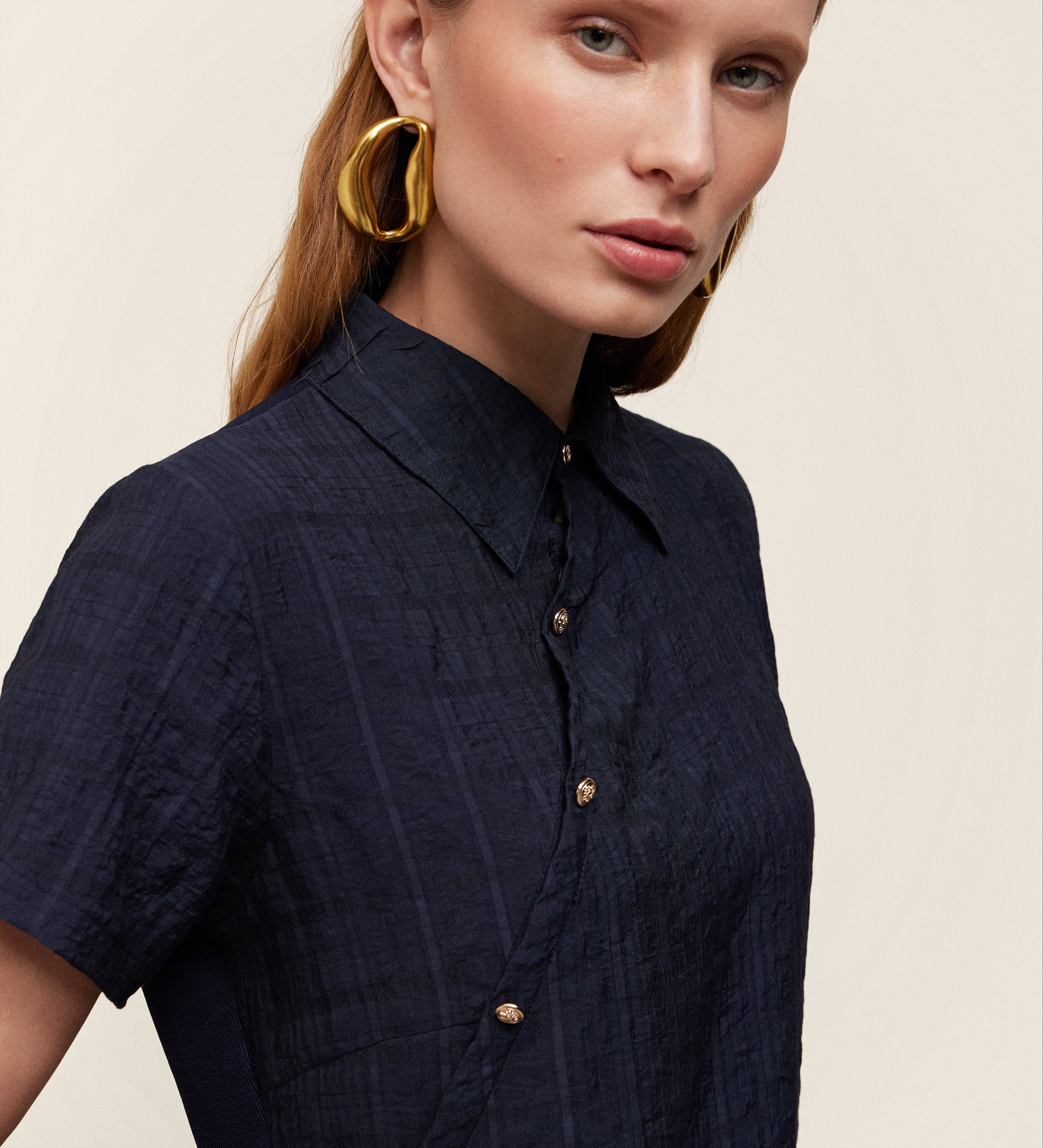 Top asymétrique en tricot bi-matière