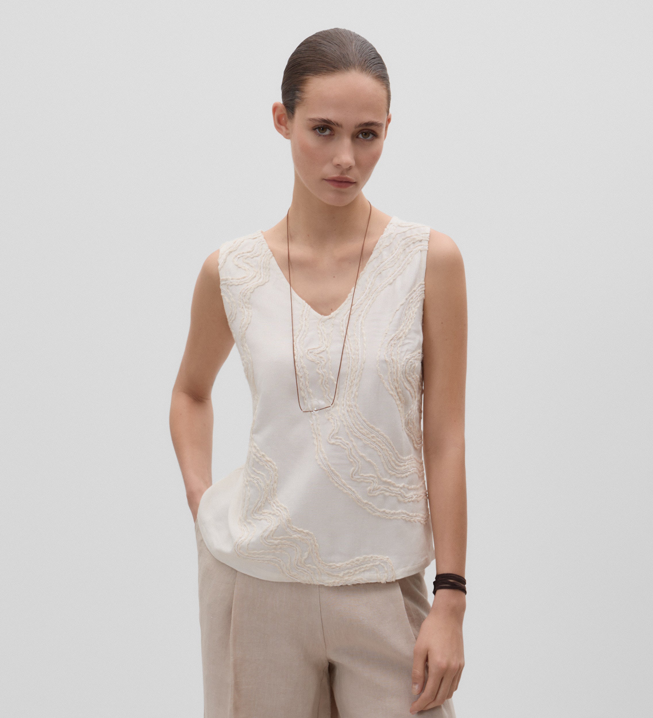 Embroidered sleeveless top