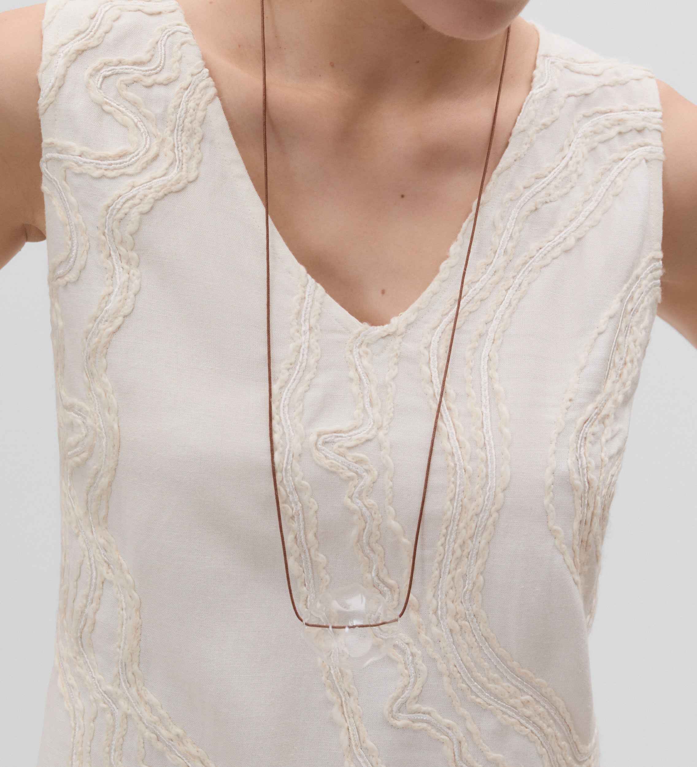 Embroidered sleeveless top