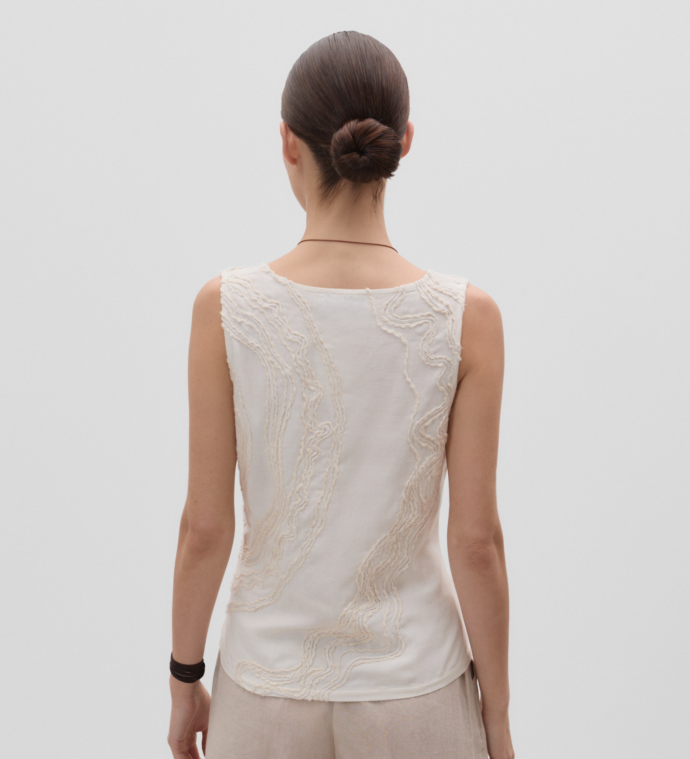 Embroidered sleeveless top