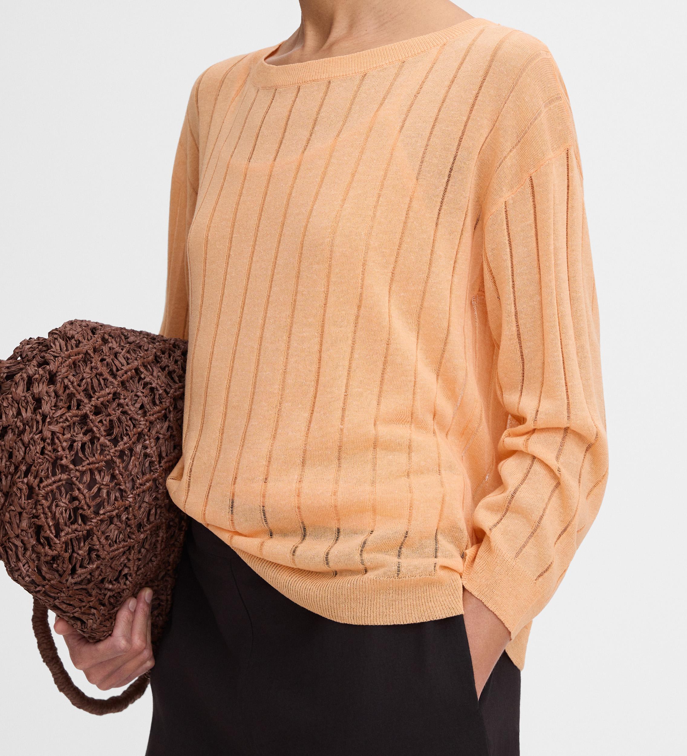 Loose-fitting openwork sweater