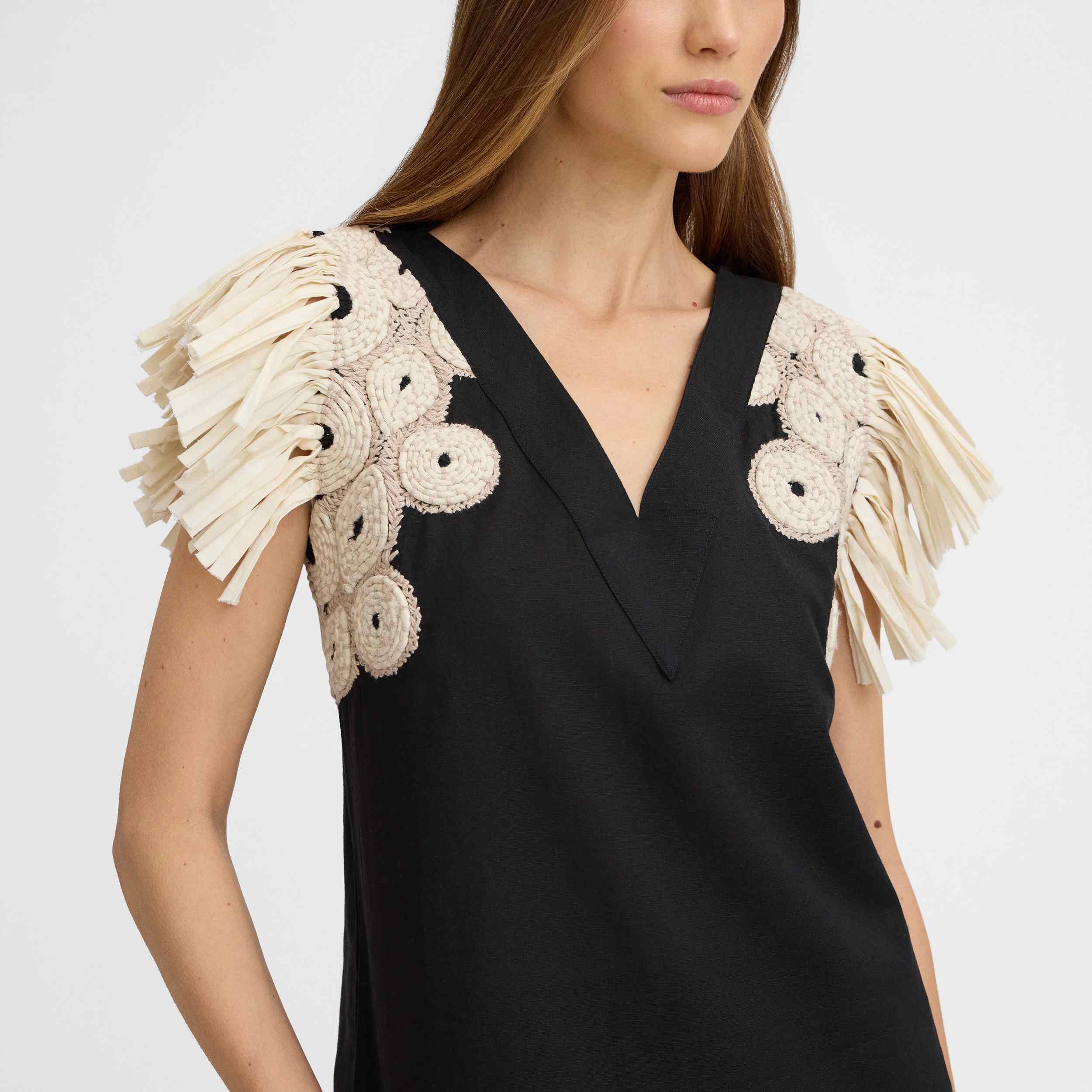 Embroidered fringe top