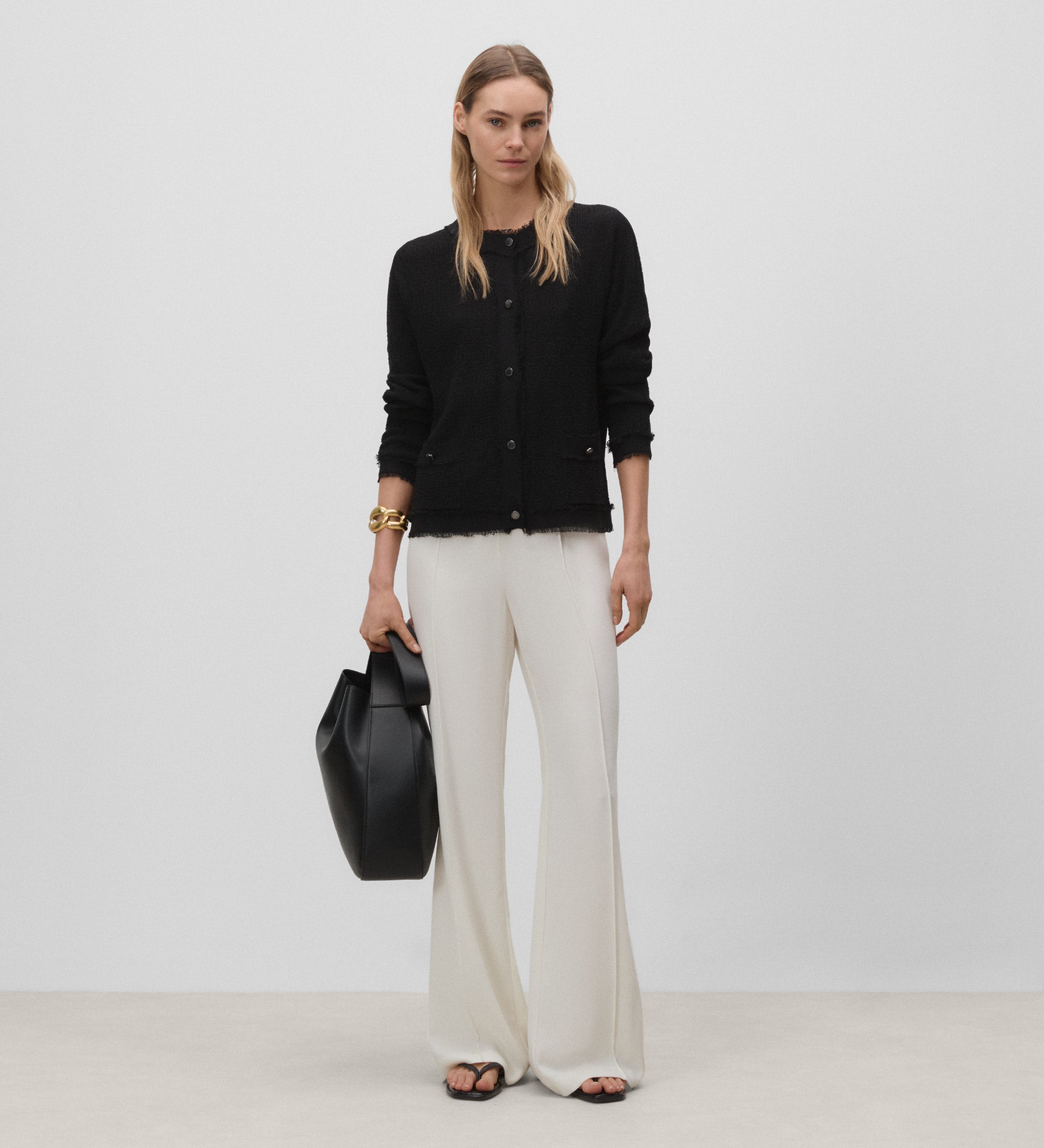 Veste en tricot effiloché