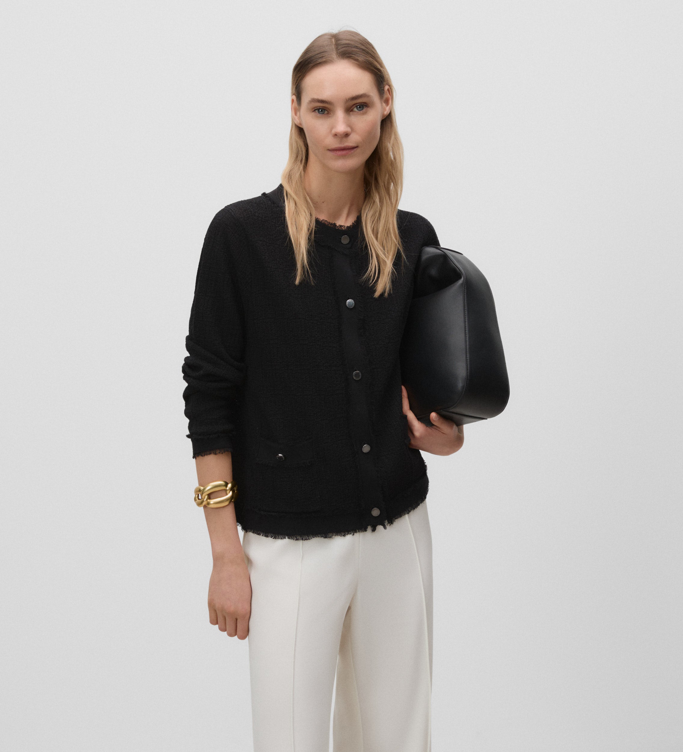 Veste en tricot effiloché