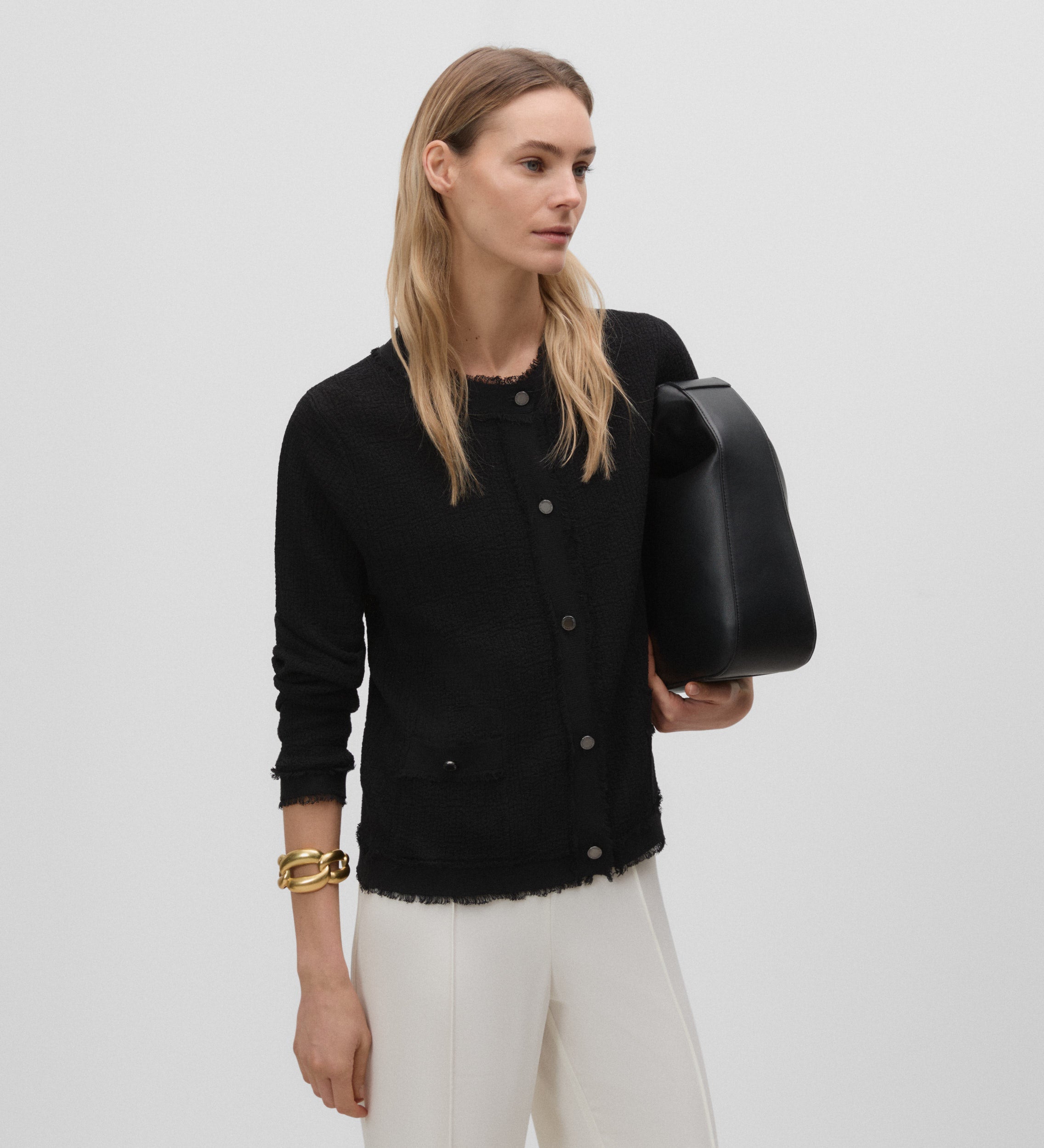 Veste en tricot effiloché