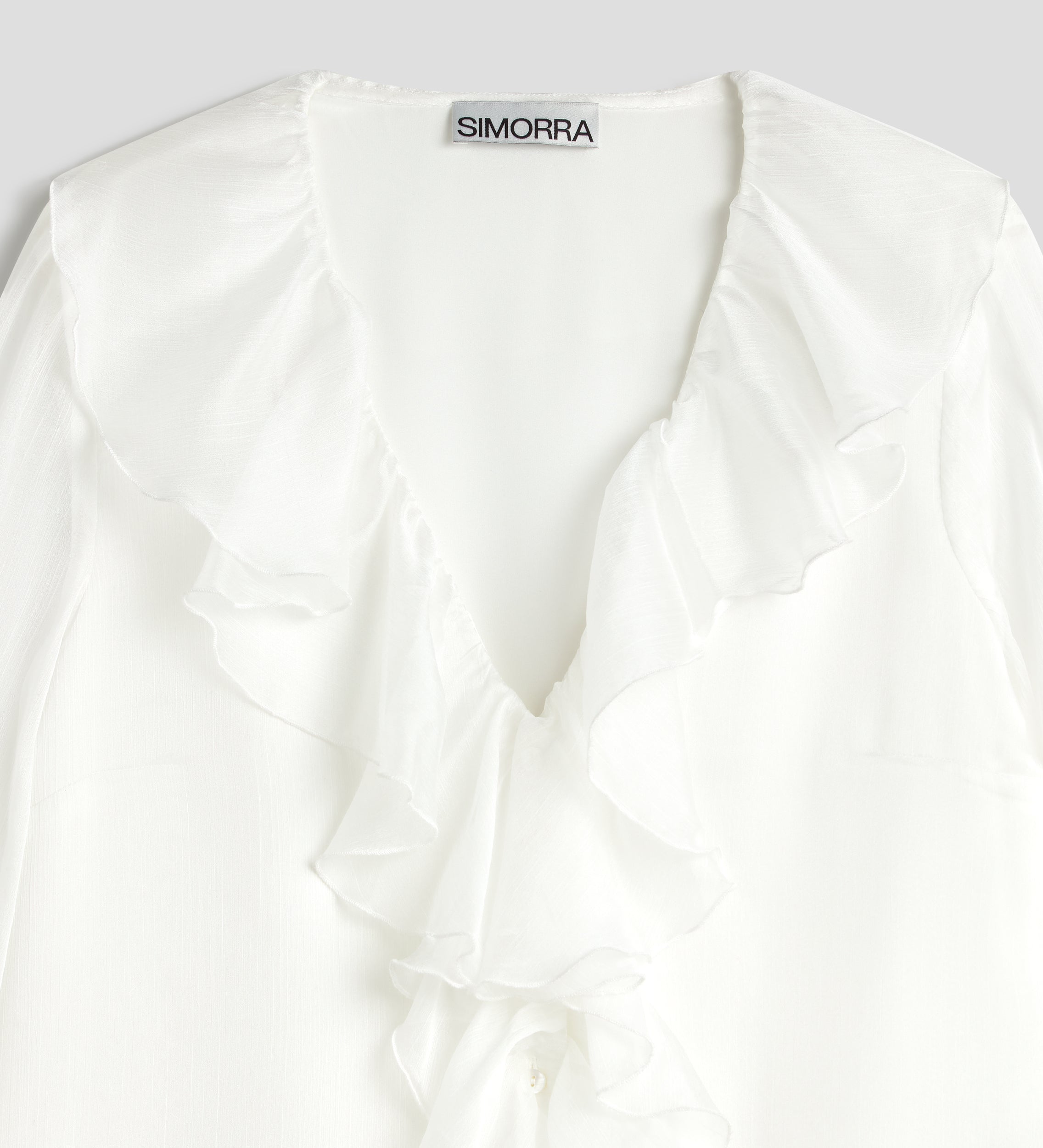 Blusa fluida volantes