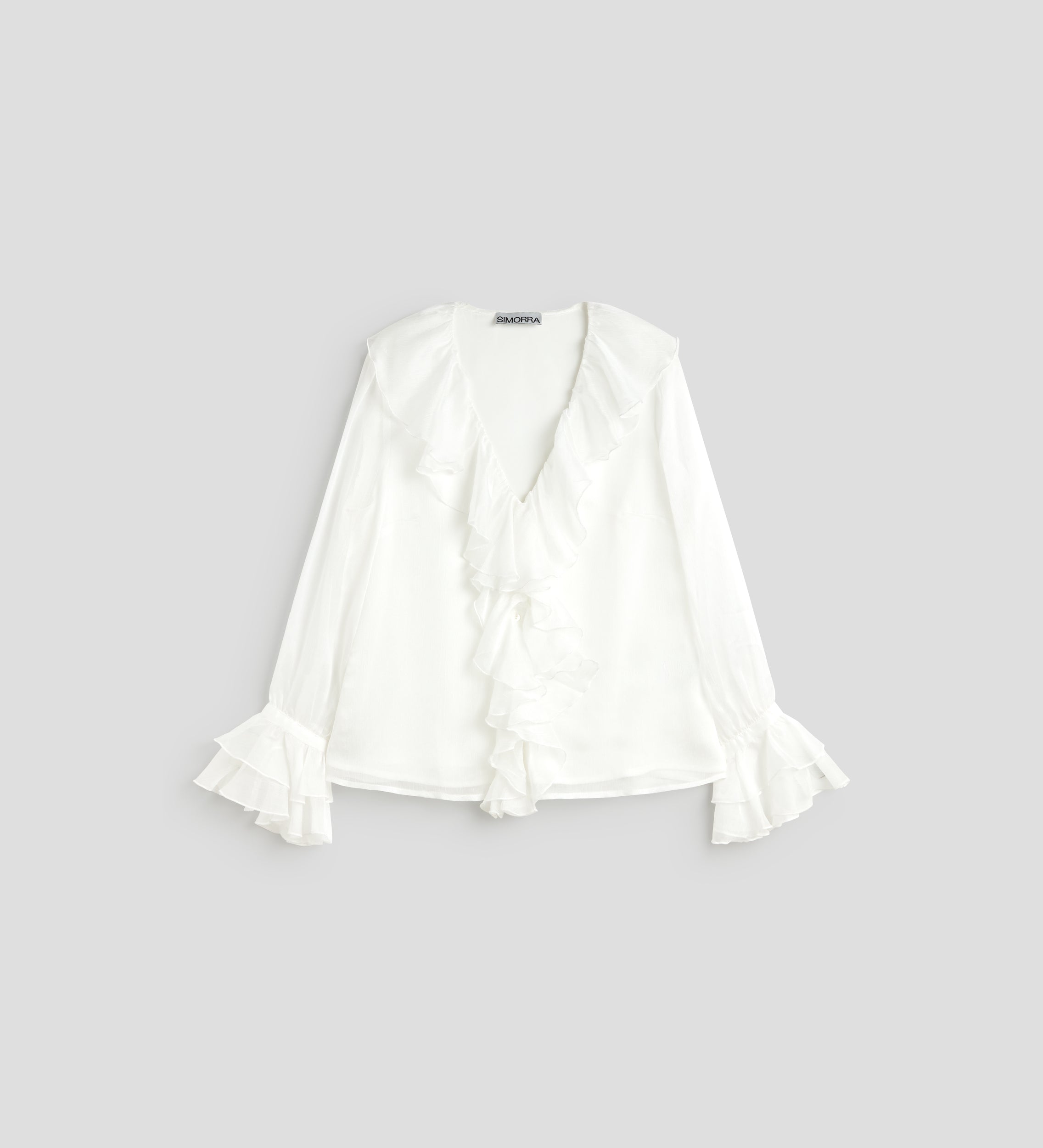 Blusa fluida volantes