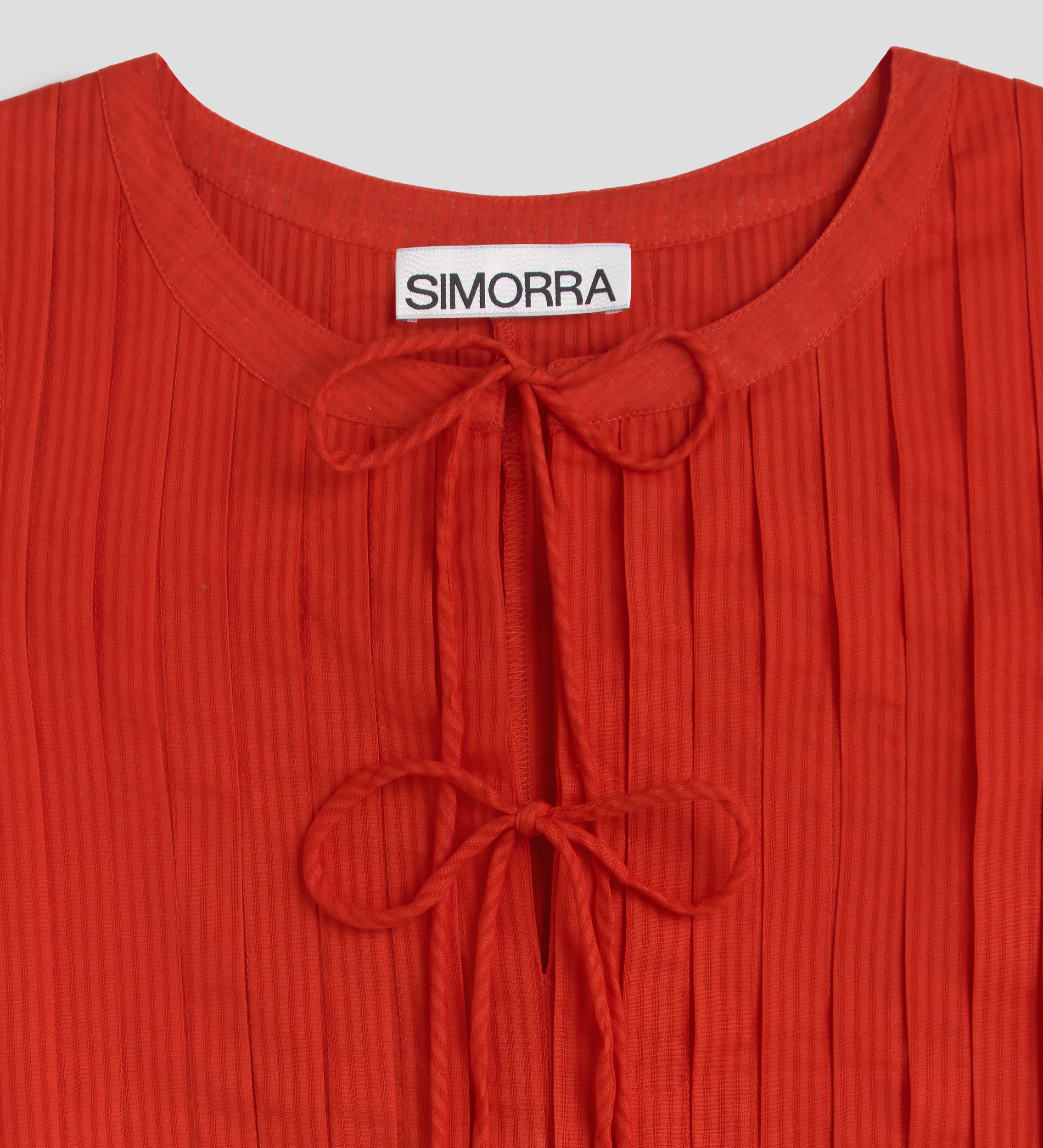 Top pleats bow