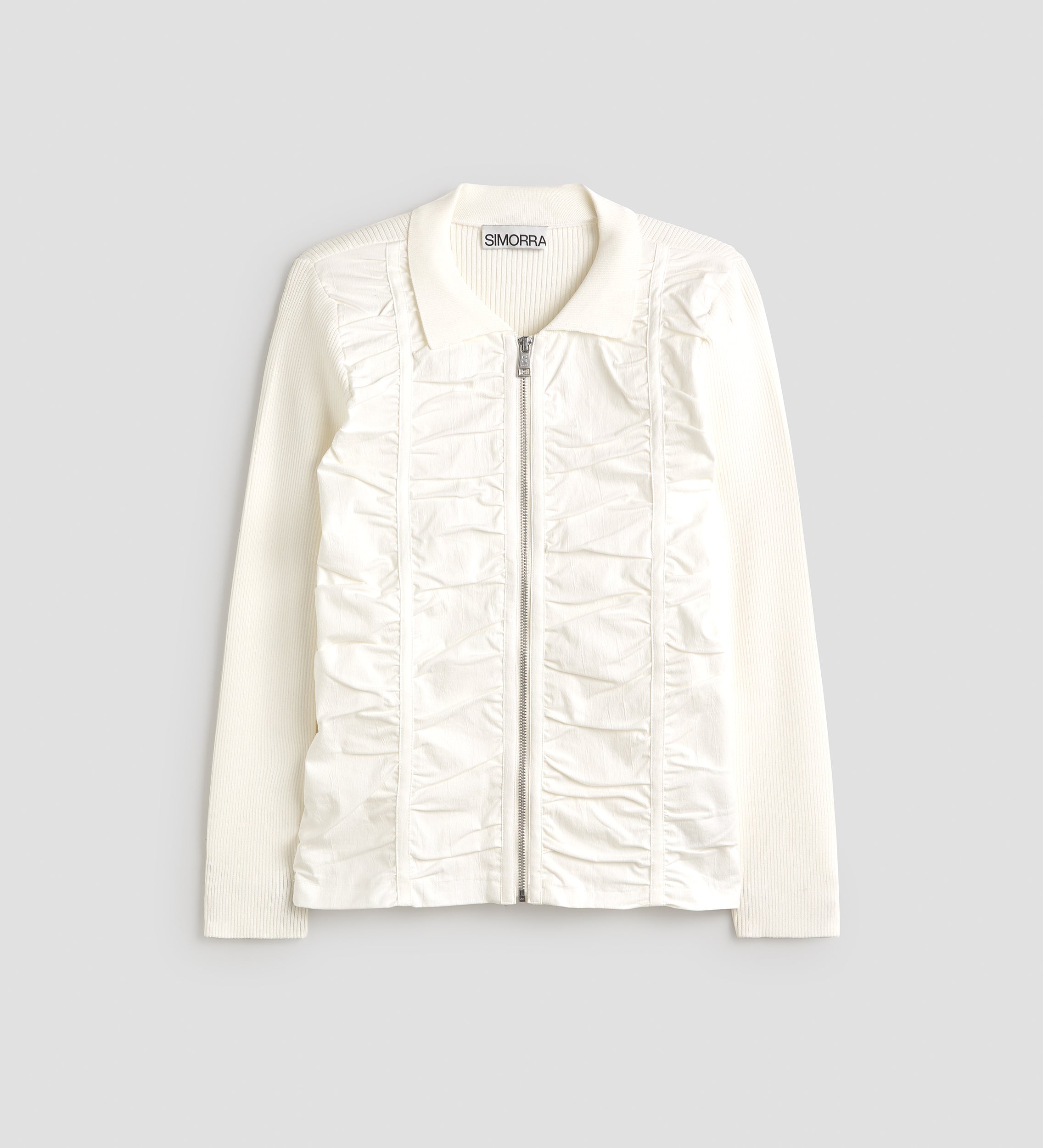 Chaqueta de punto bimateria