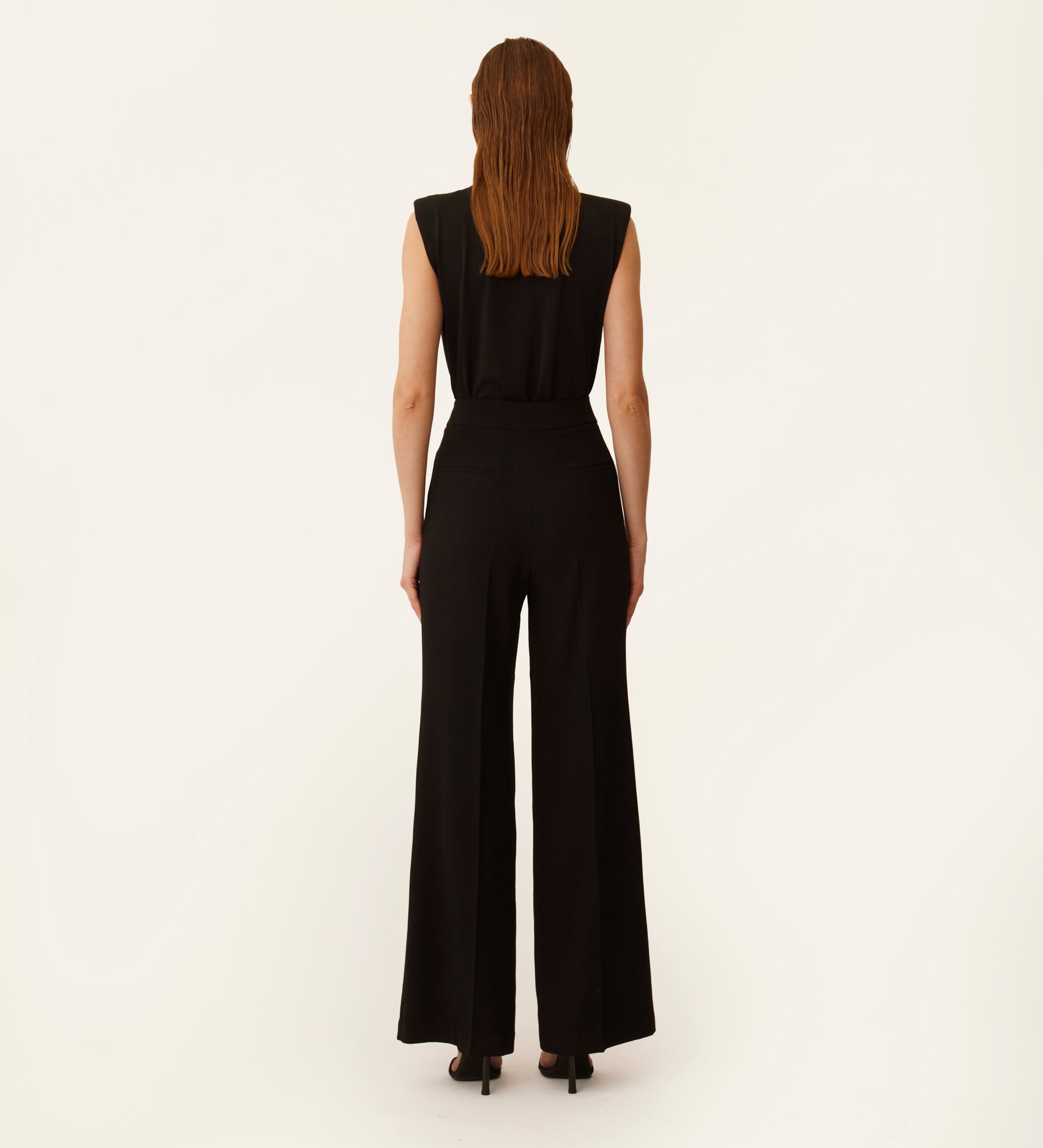 Flared hem crepe trousers