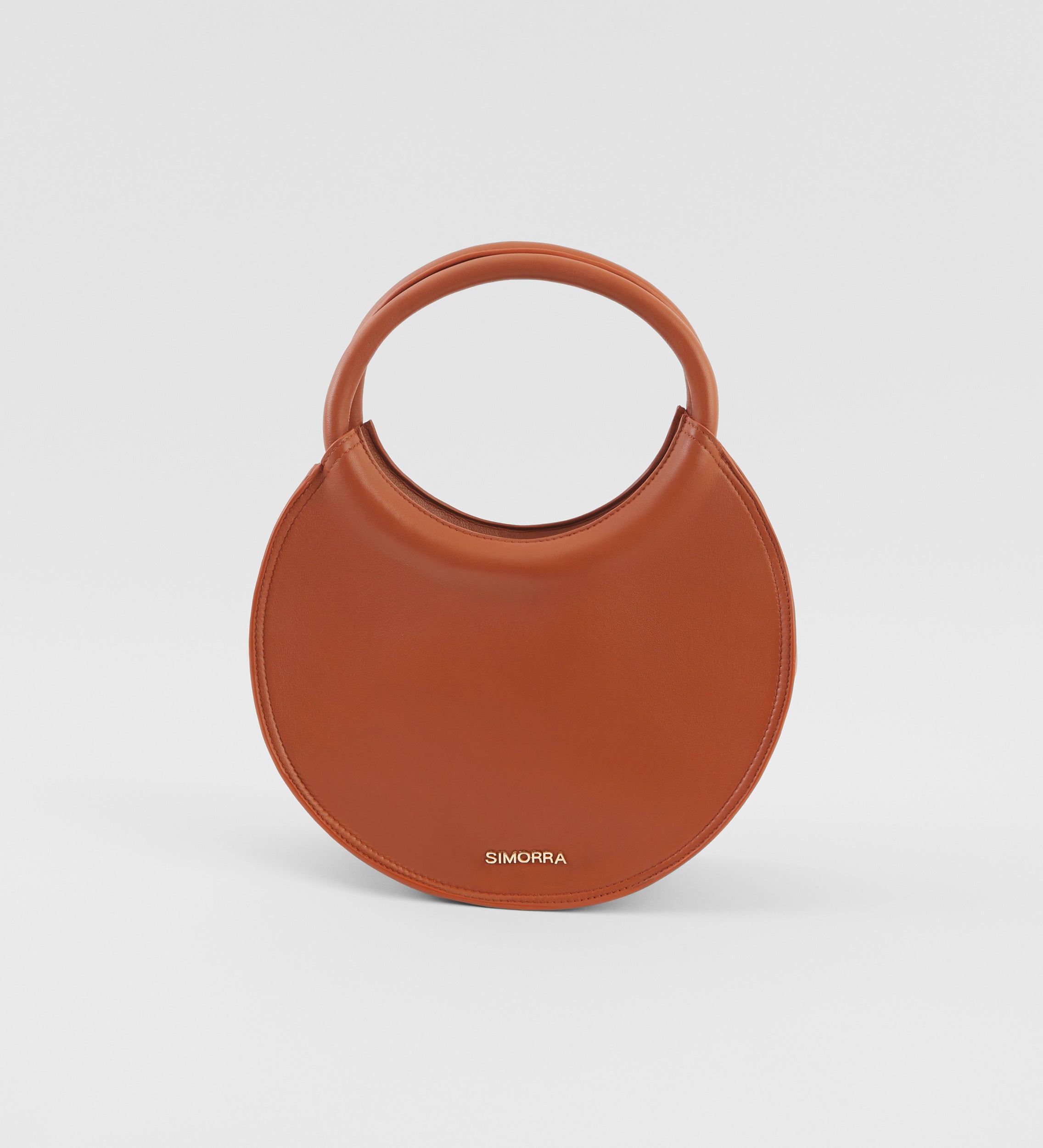 Circular leather bag