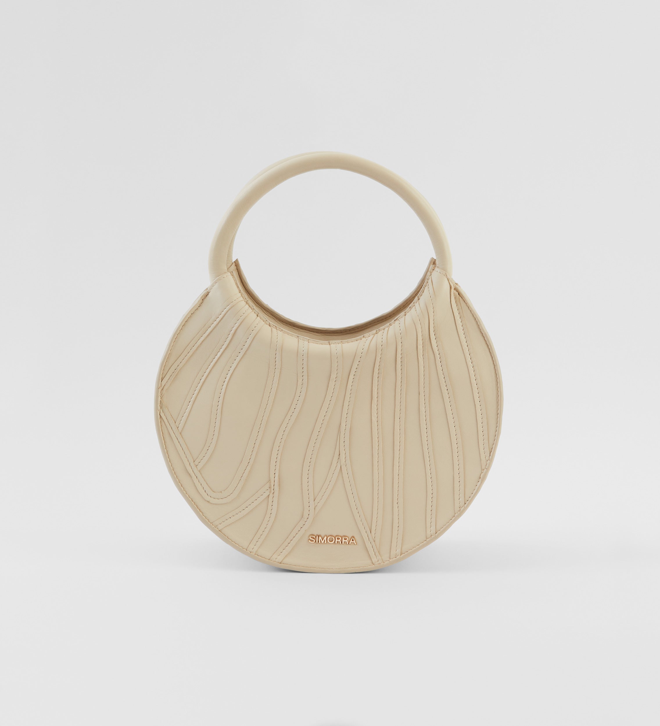 Circular leather bag