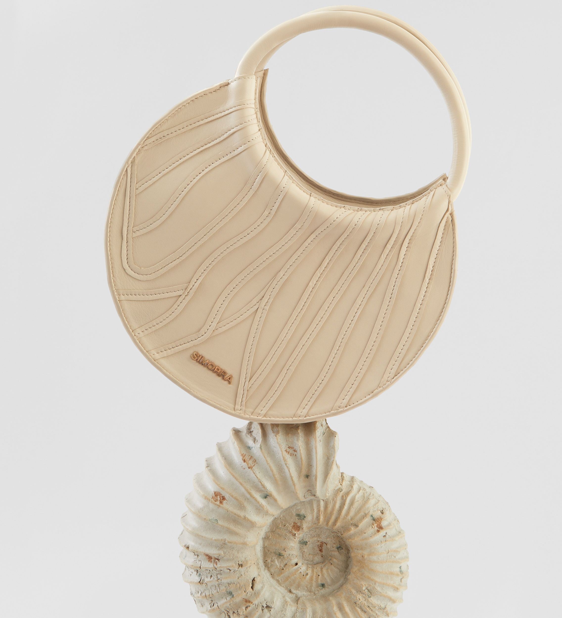 Bolso circular piel