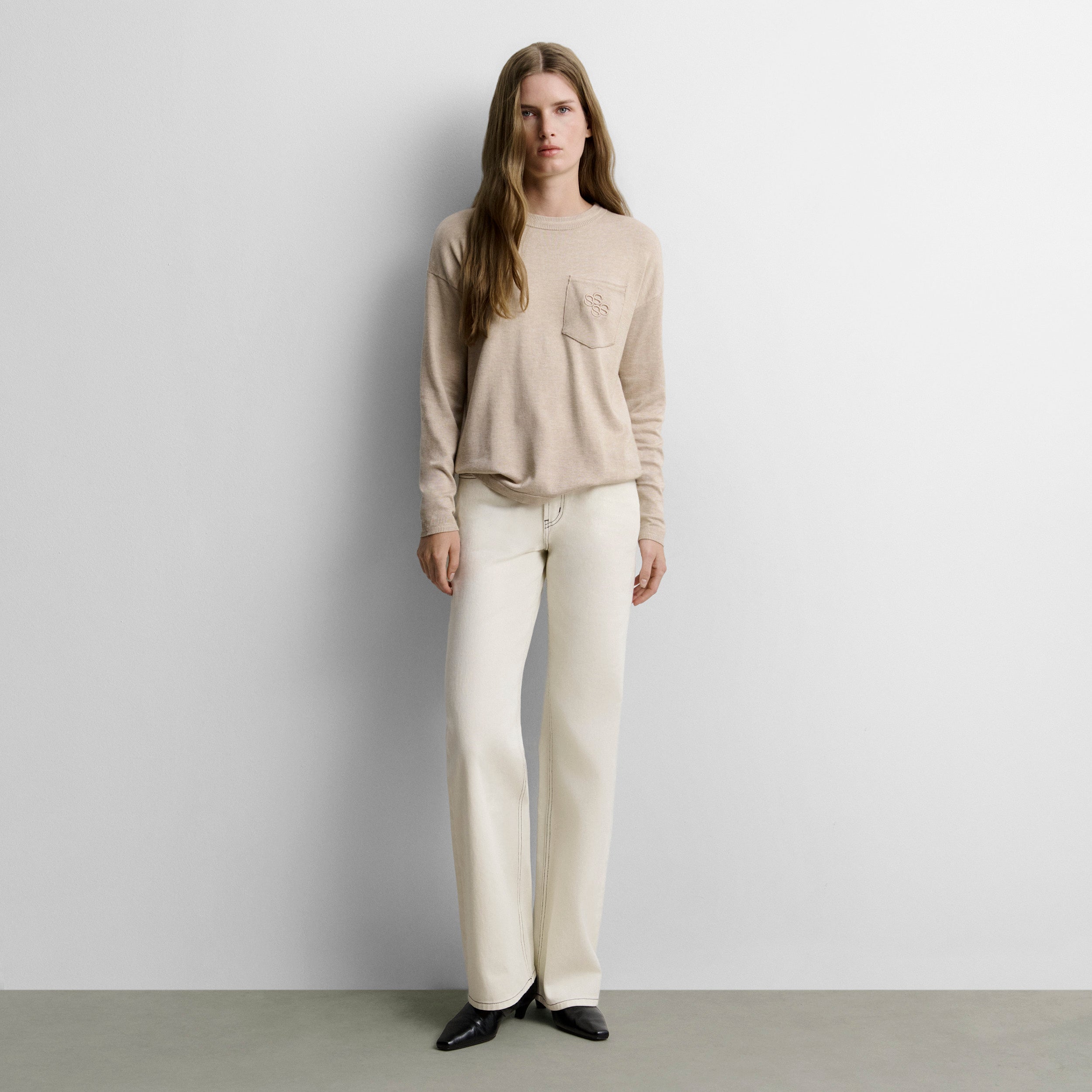 Pull en tricot poche