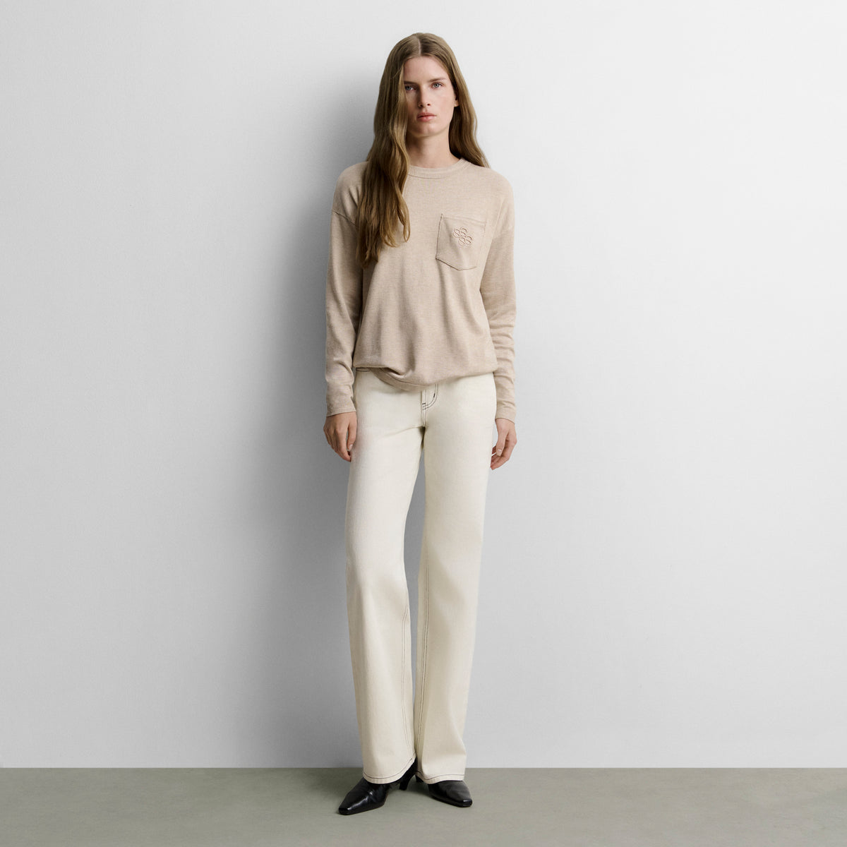 Pull en tricot poche