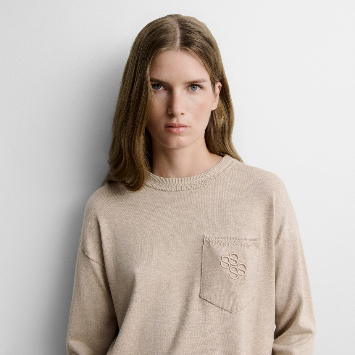 Pull en tricot poche