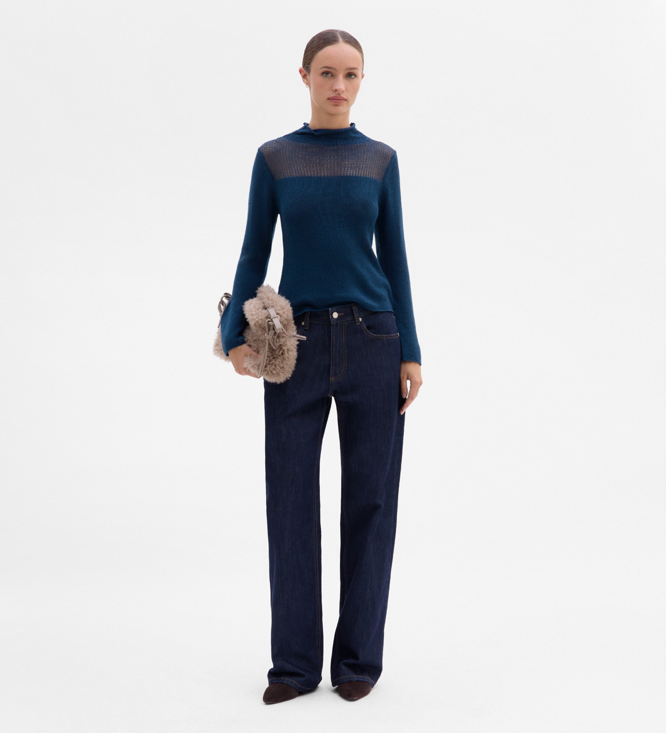Sweater with unstitched detail