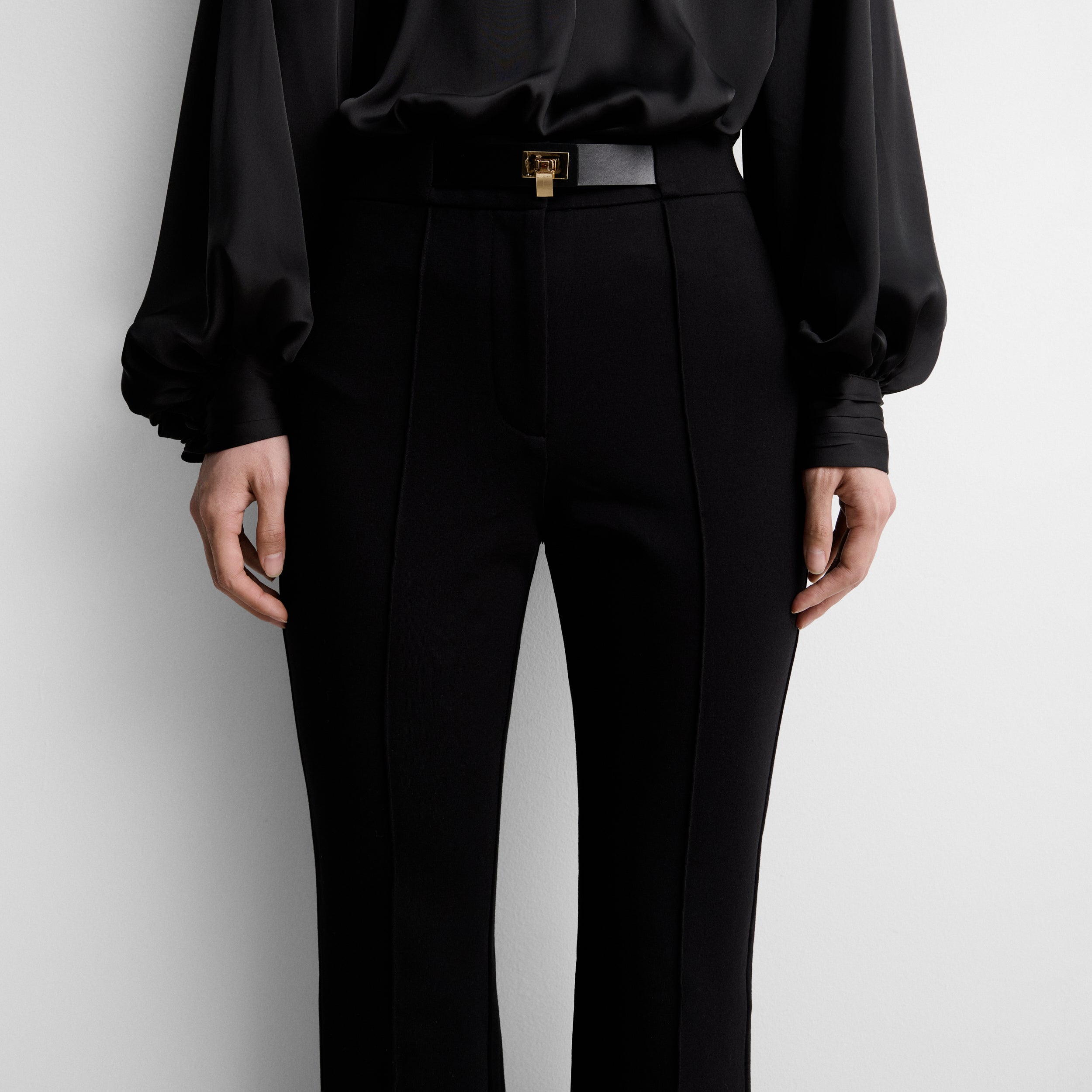 Elastic trousers with locker-loop fastening