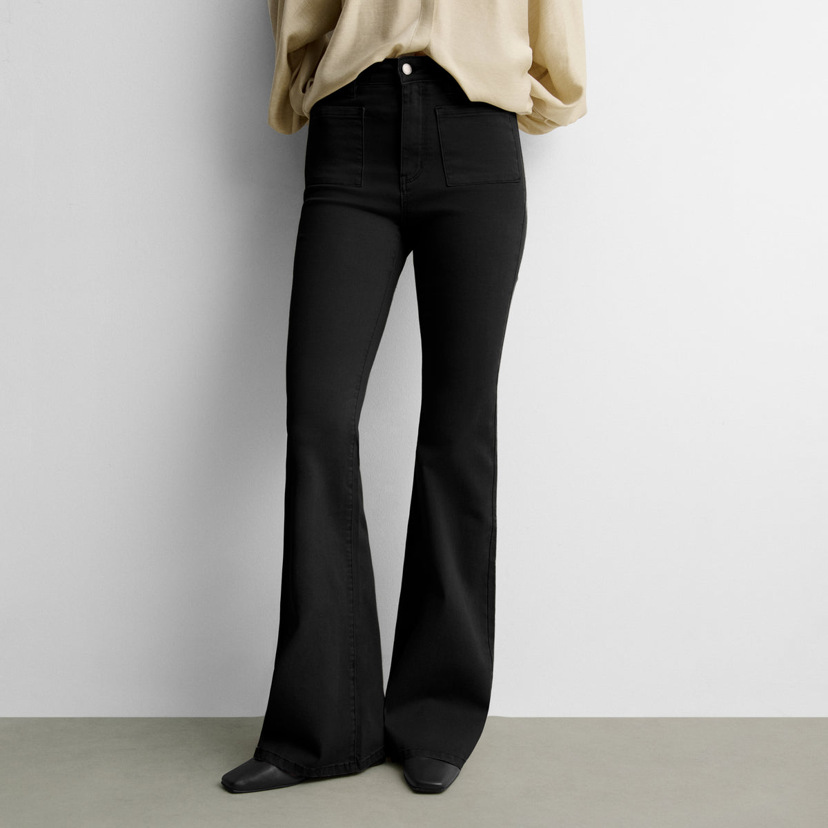 Pantalón bolsillos parche