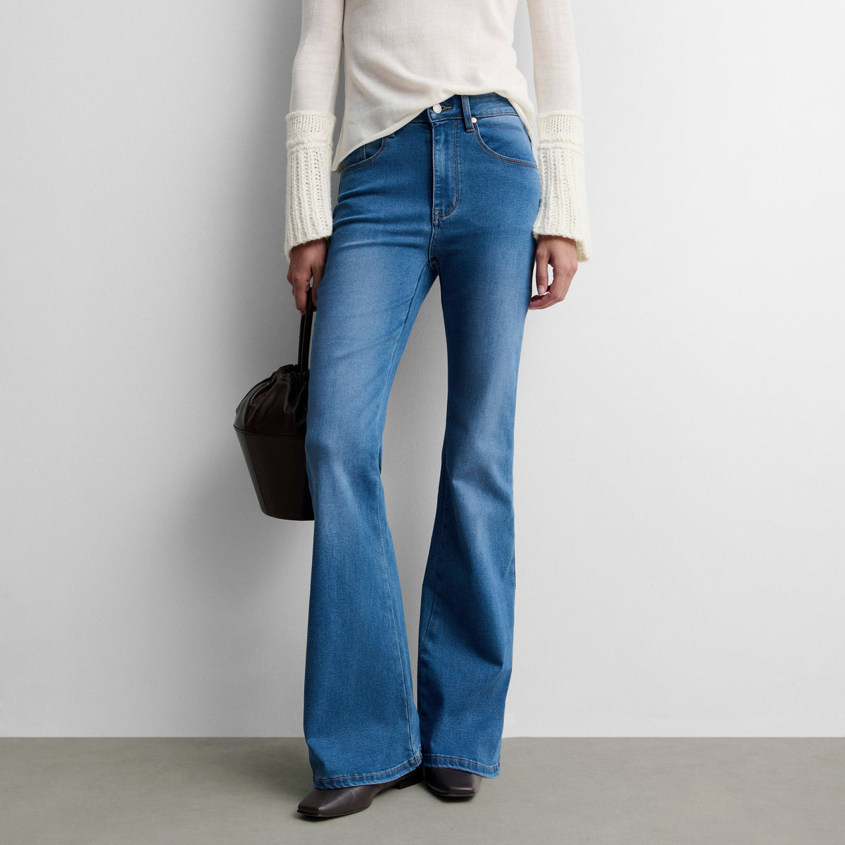 Flared denim trousers