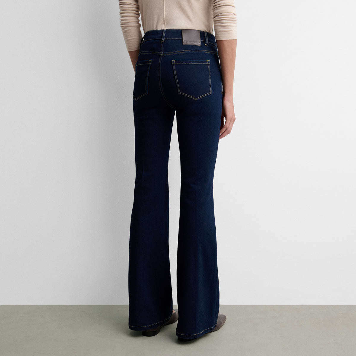 Flared denim trousers