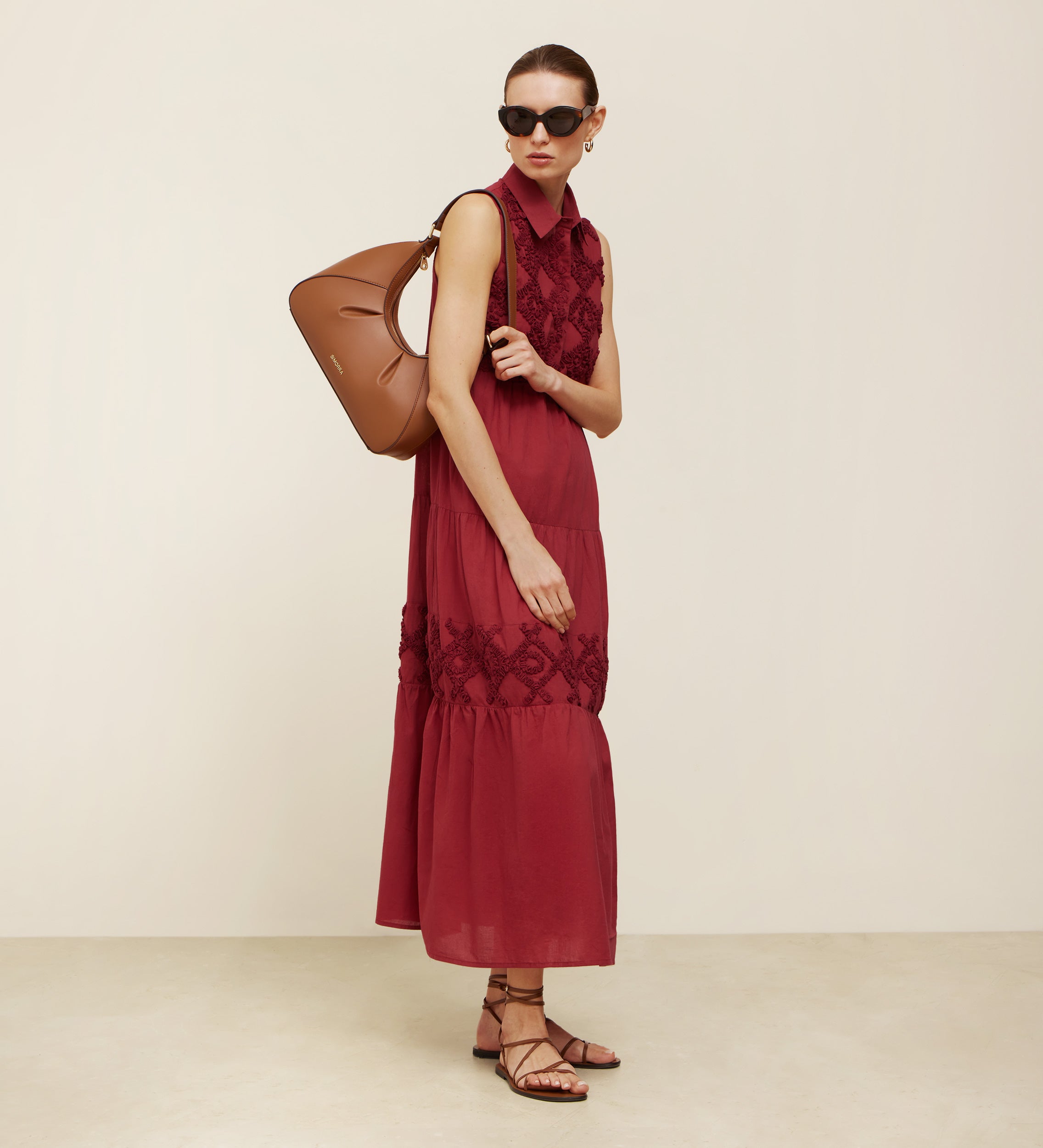 Embroidered dress with gathered floors