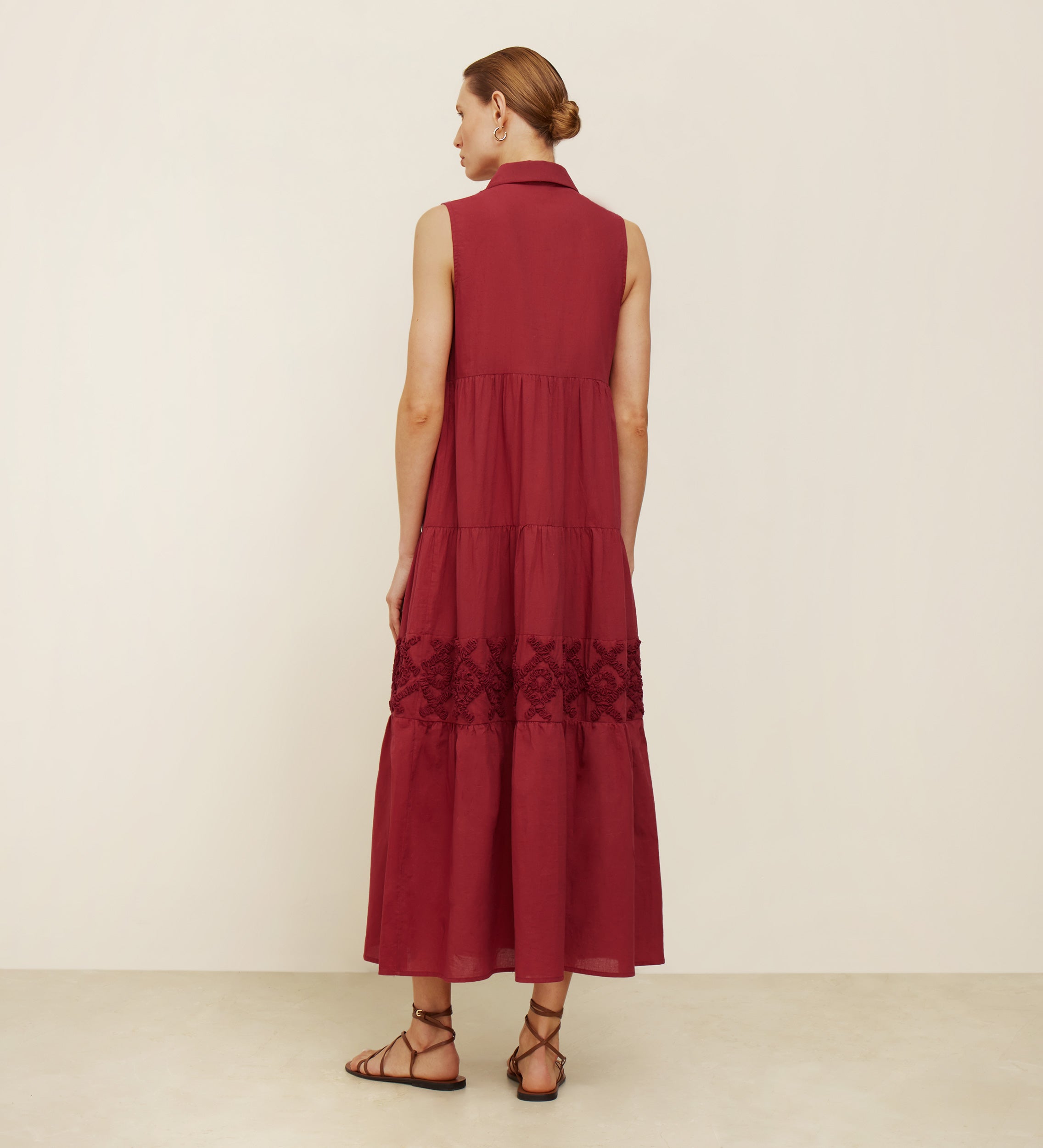 Embroidered dress with gathered floors
