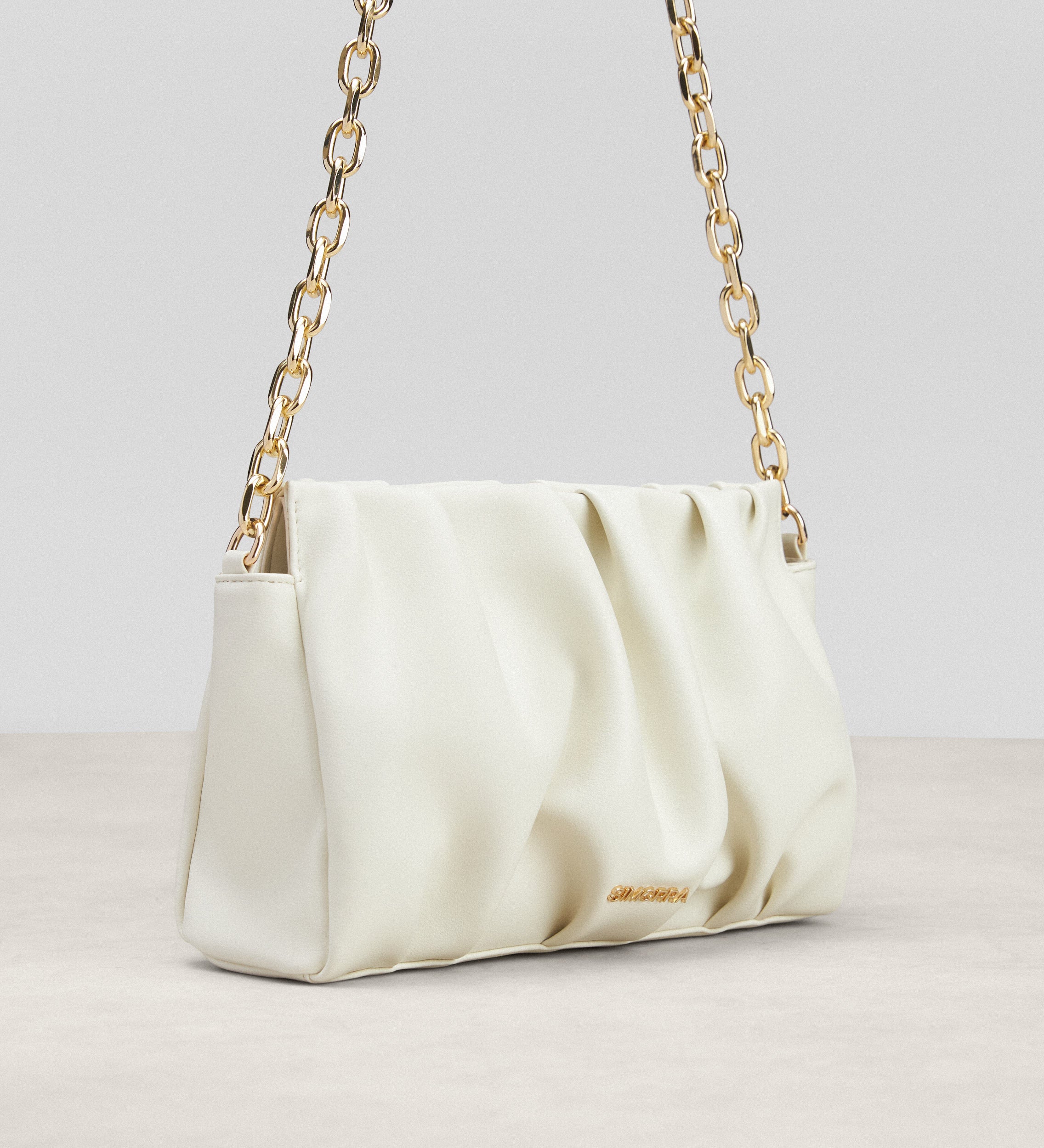 Bolso piel pliegues