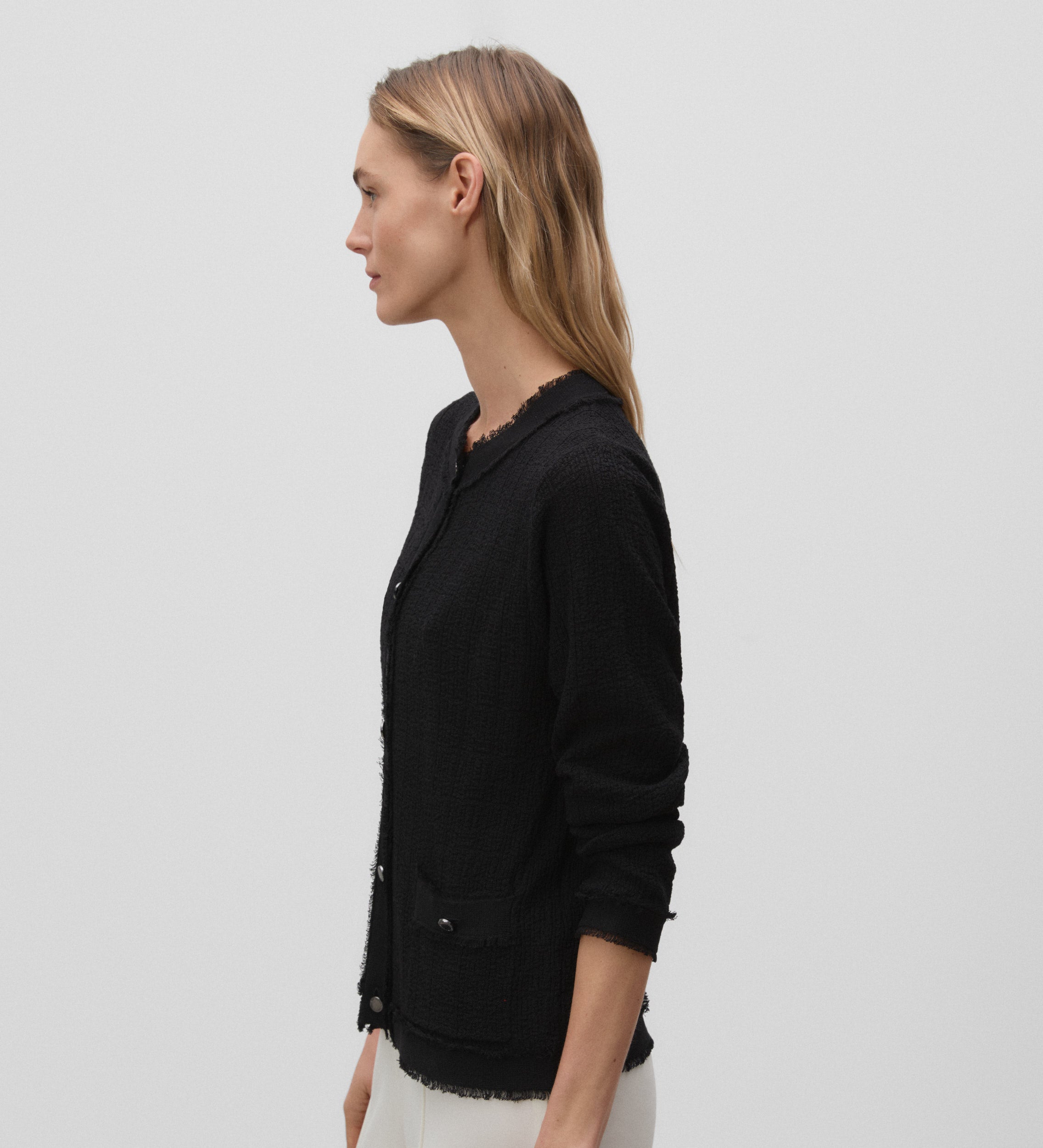 Veste en tricot effiloché